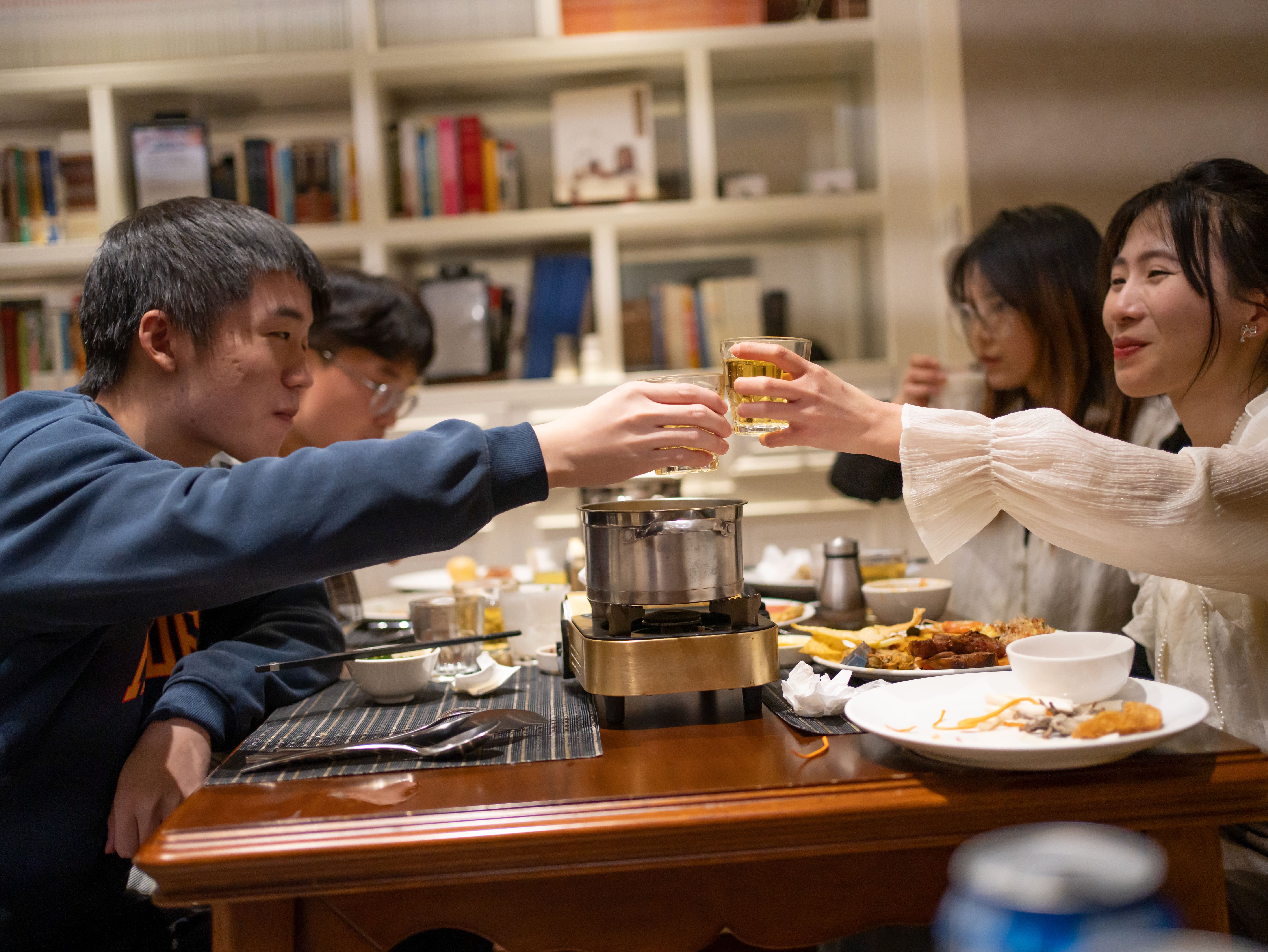 young people having dinner