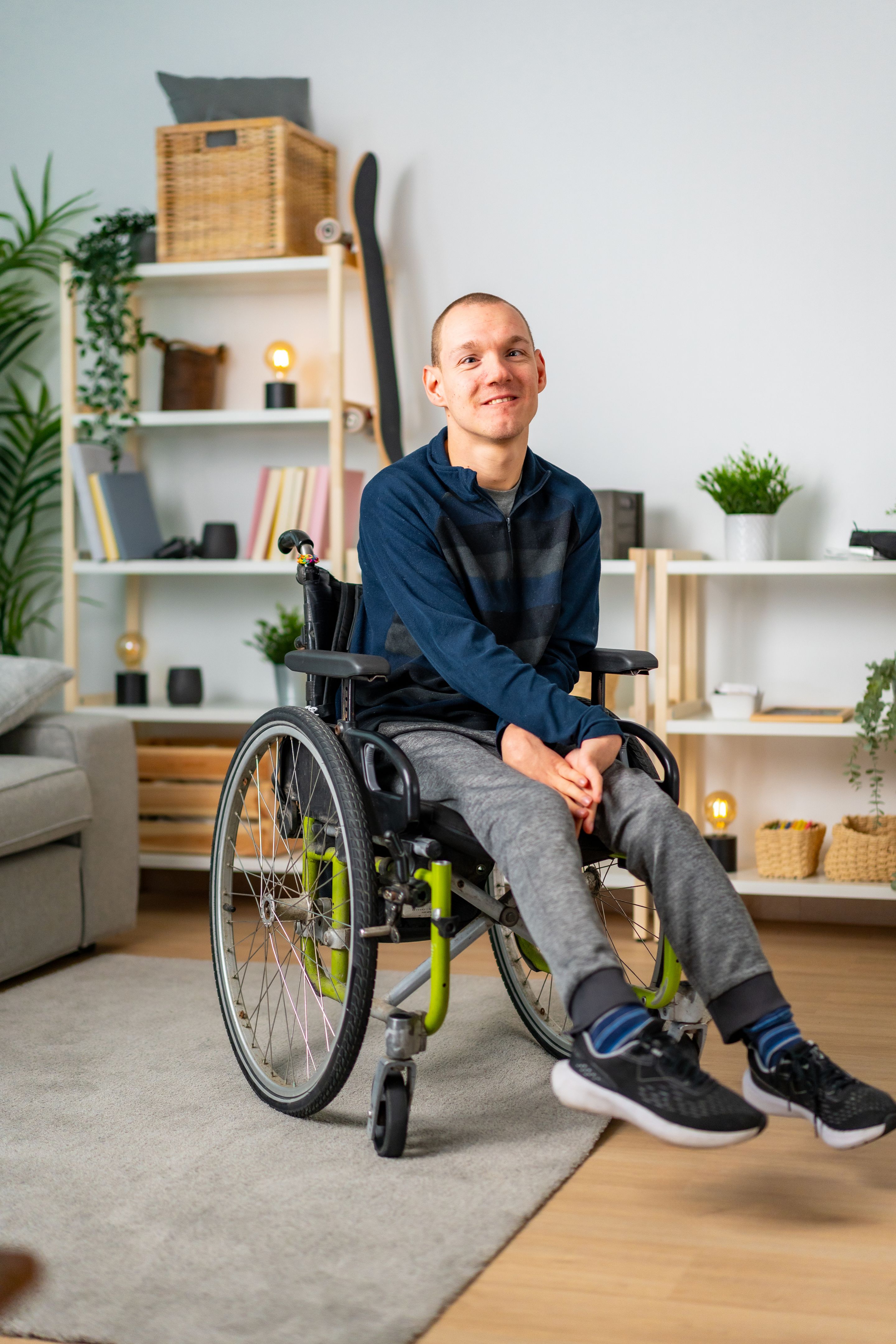 Portrait of a happy disabled man at home