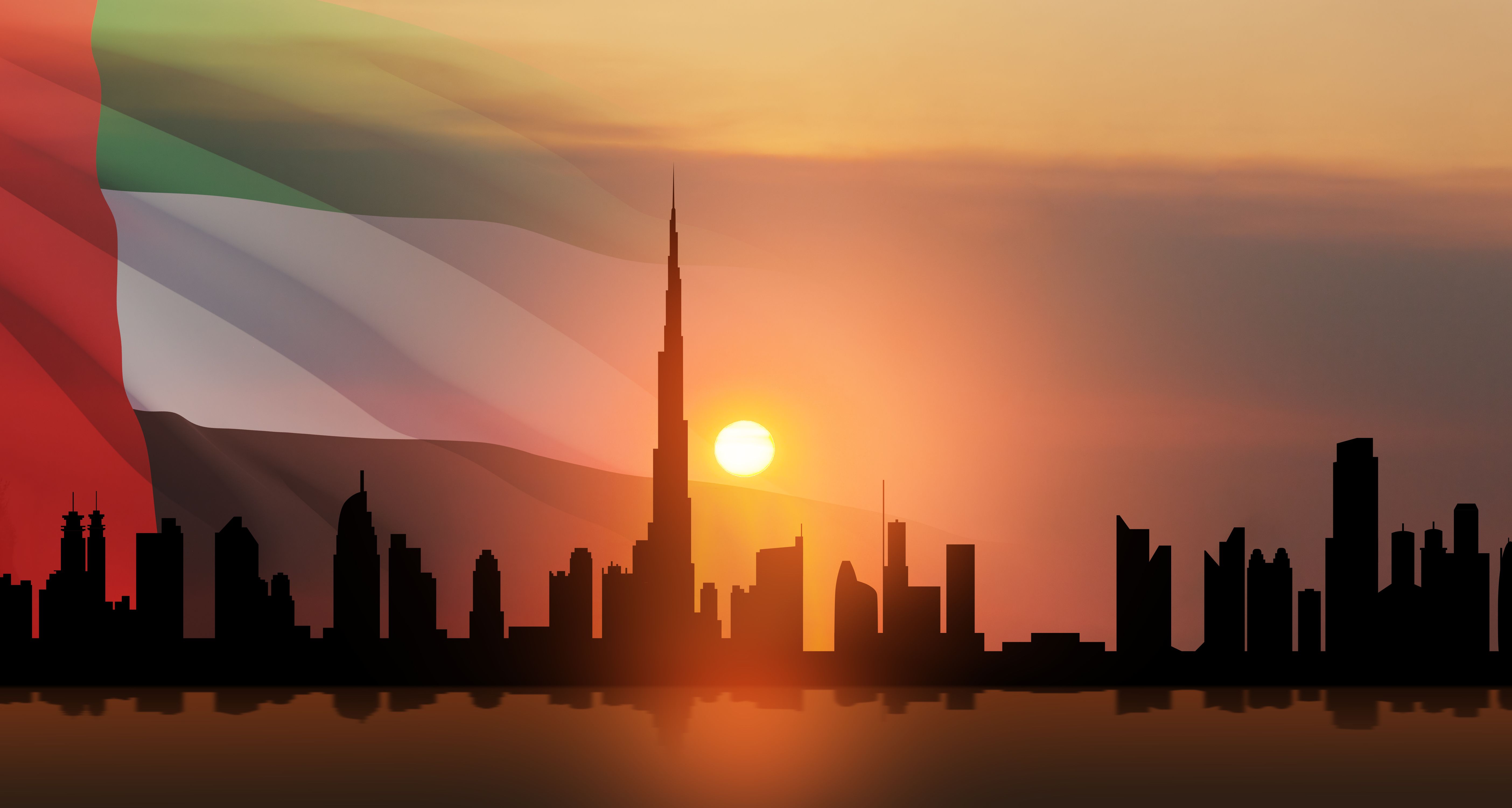 United Arab Emirates flag and Dubai skyline view at sunset. UAE celebration. United Arab Emirates flag and Dubai skyline view at sunset. UAE celebration.