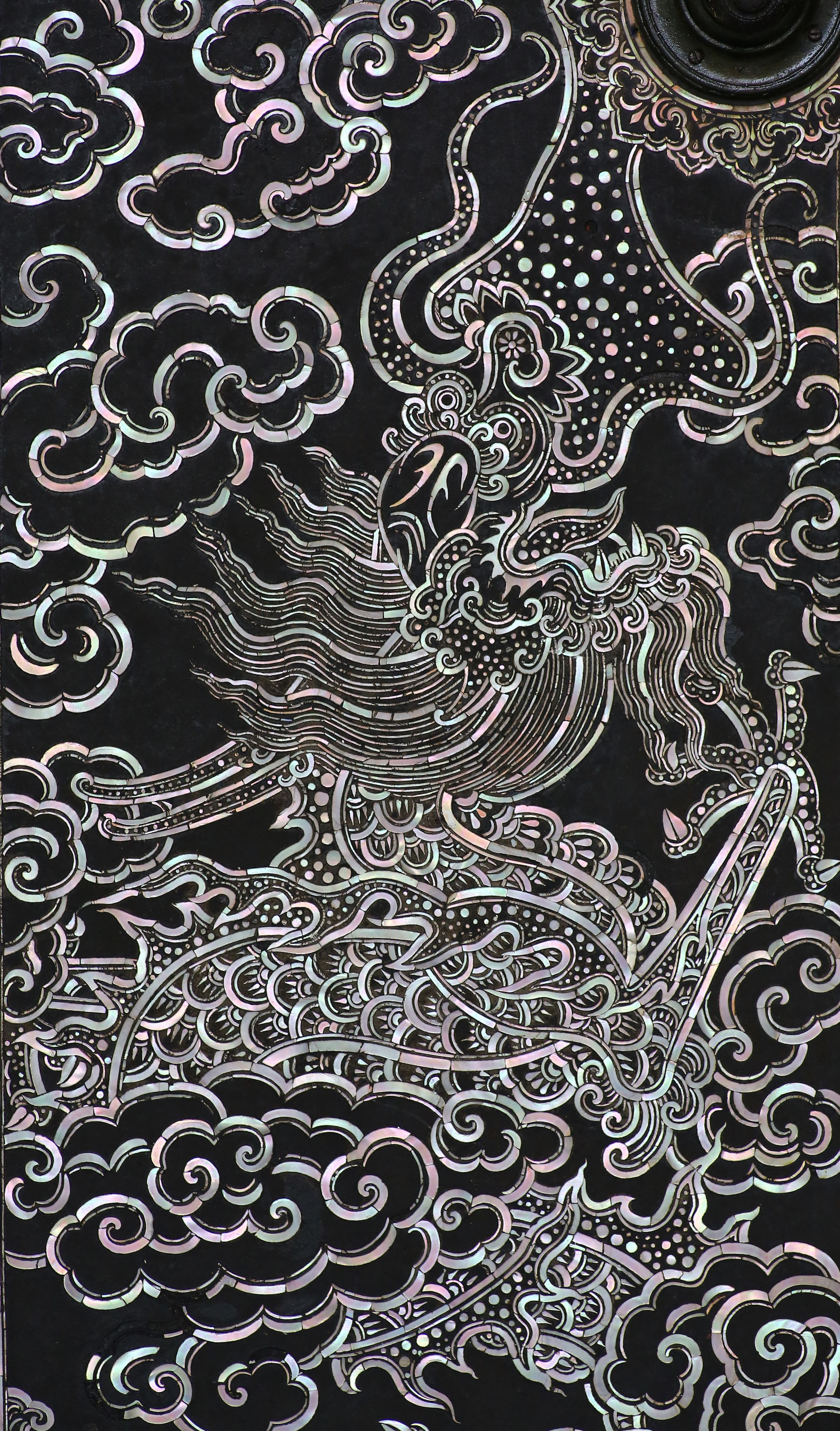 China Dragon on the door at thai temple, colorful