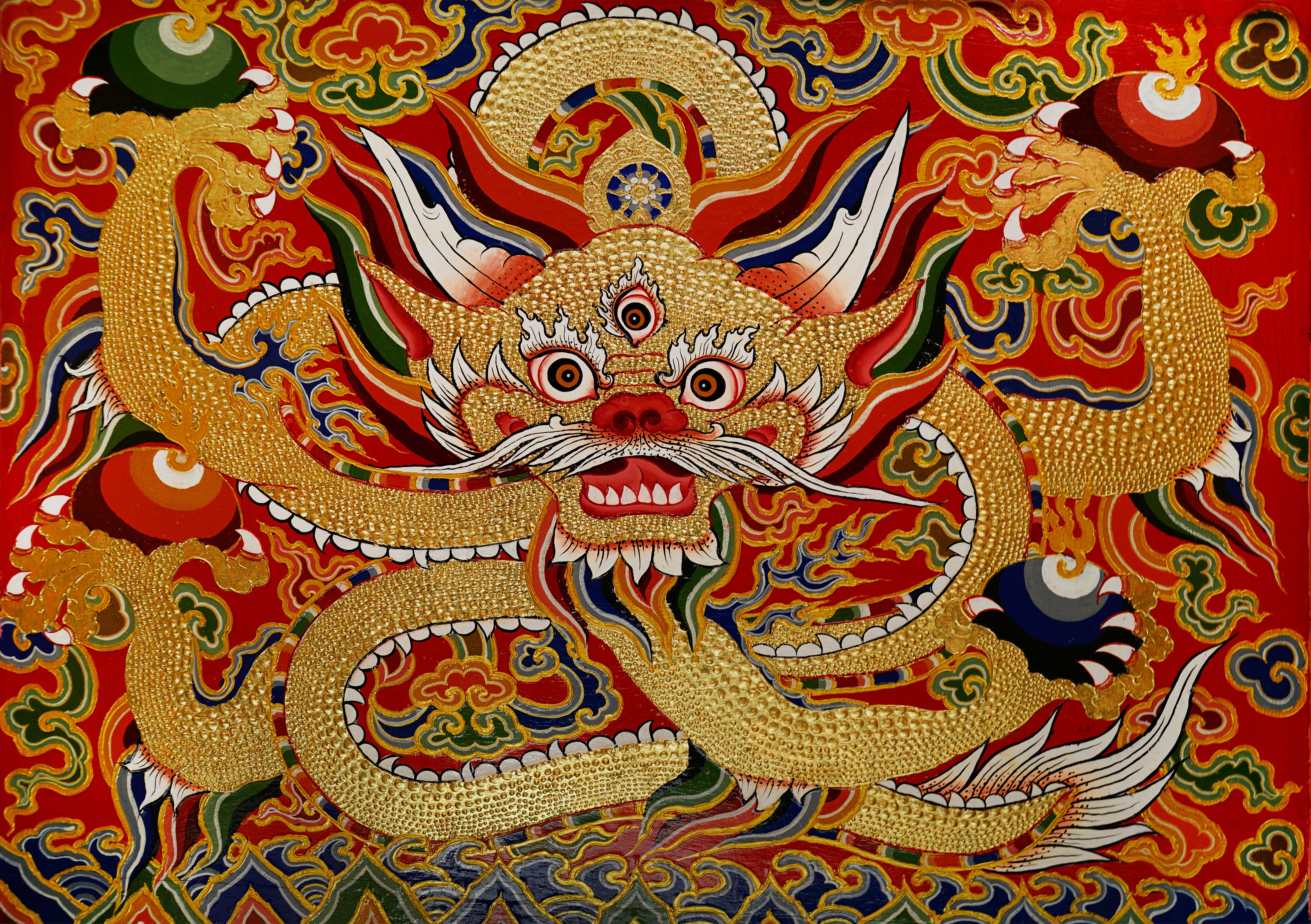 dragon wall painting with gold decorated in Sera Monastery, Lhasa, China.