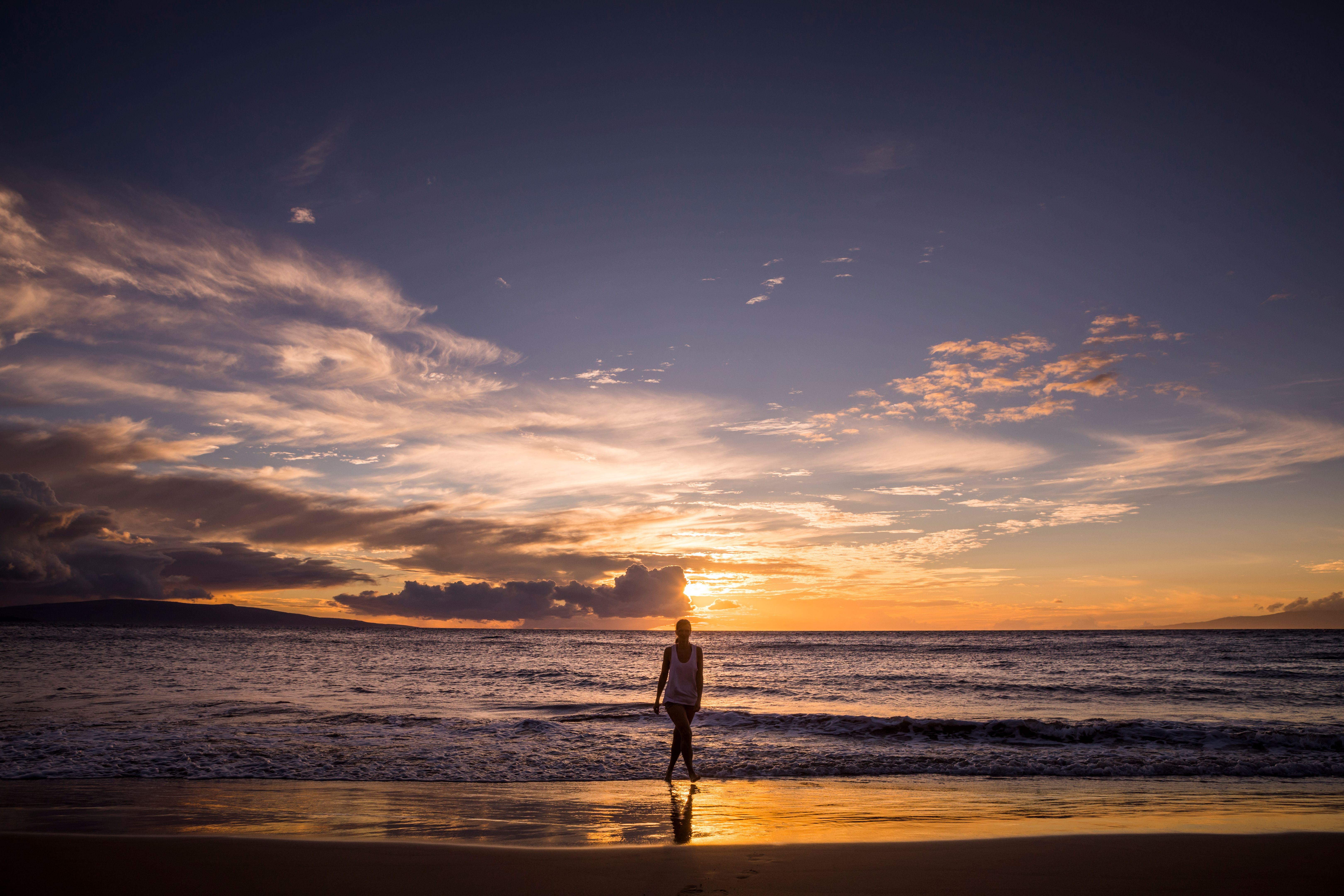 Tropical sunset on beach in Maui.