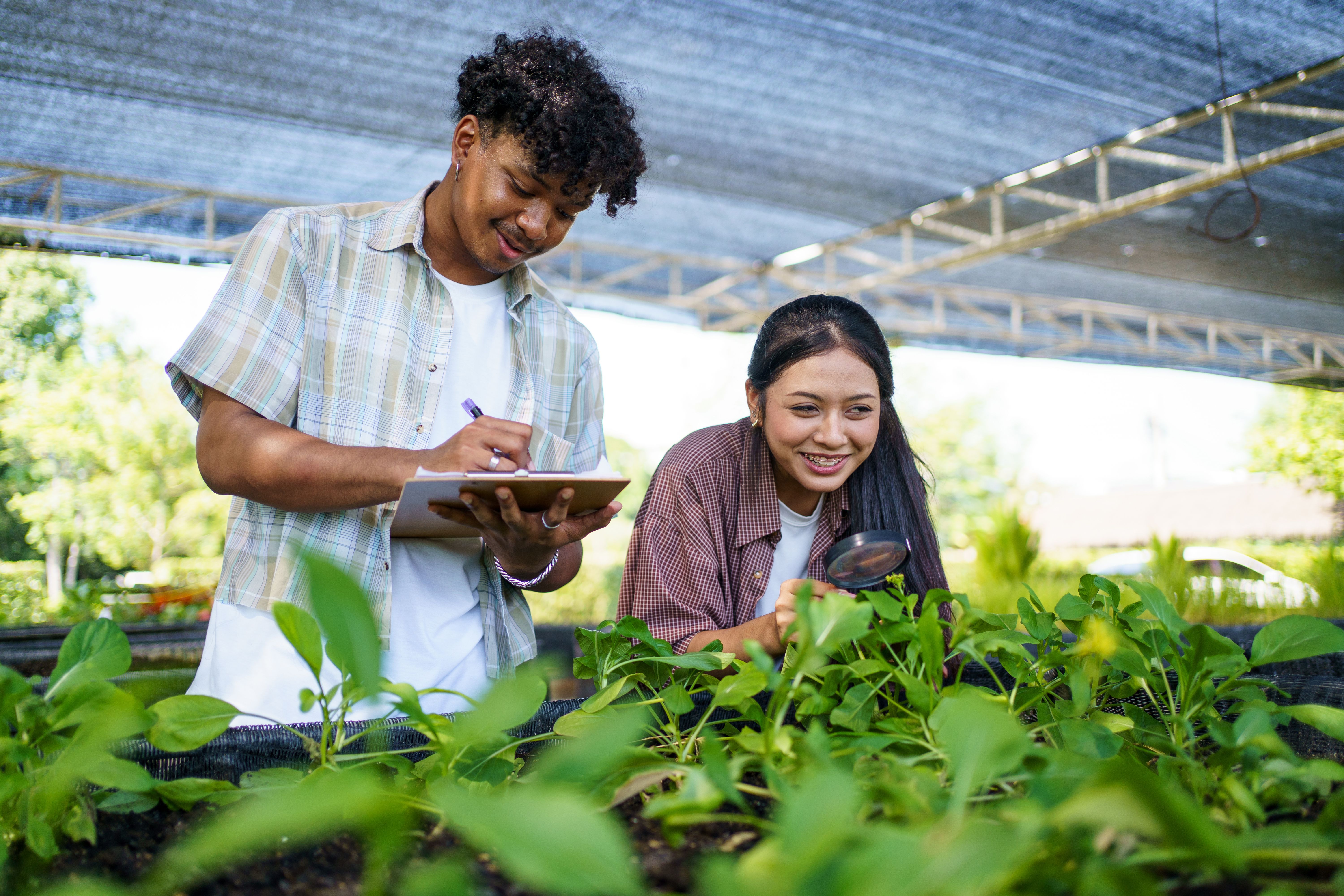 student gardening