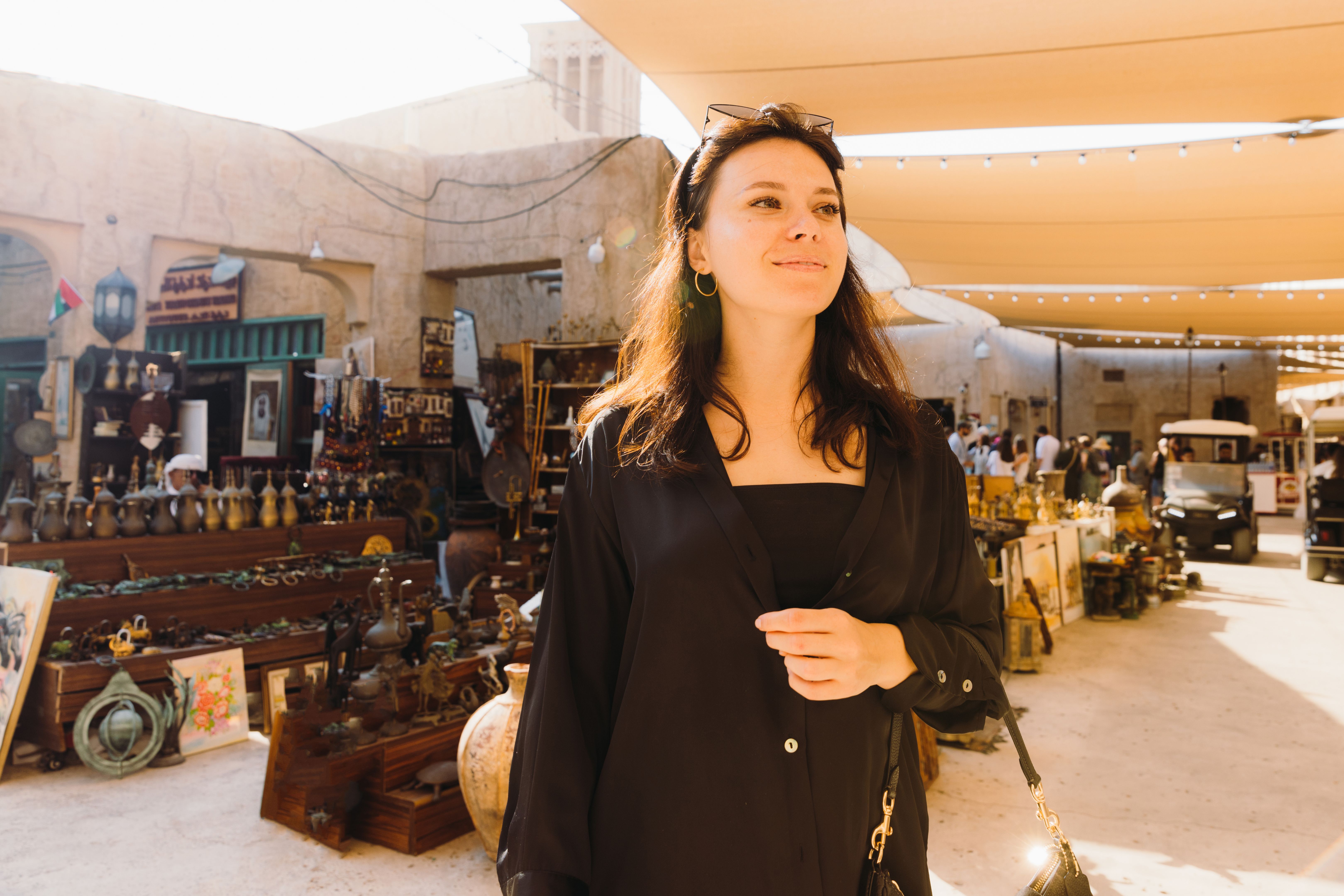 Woman Entrepreneur Shopping at Market of Old Town Dubai City