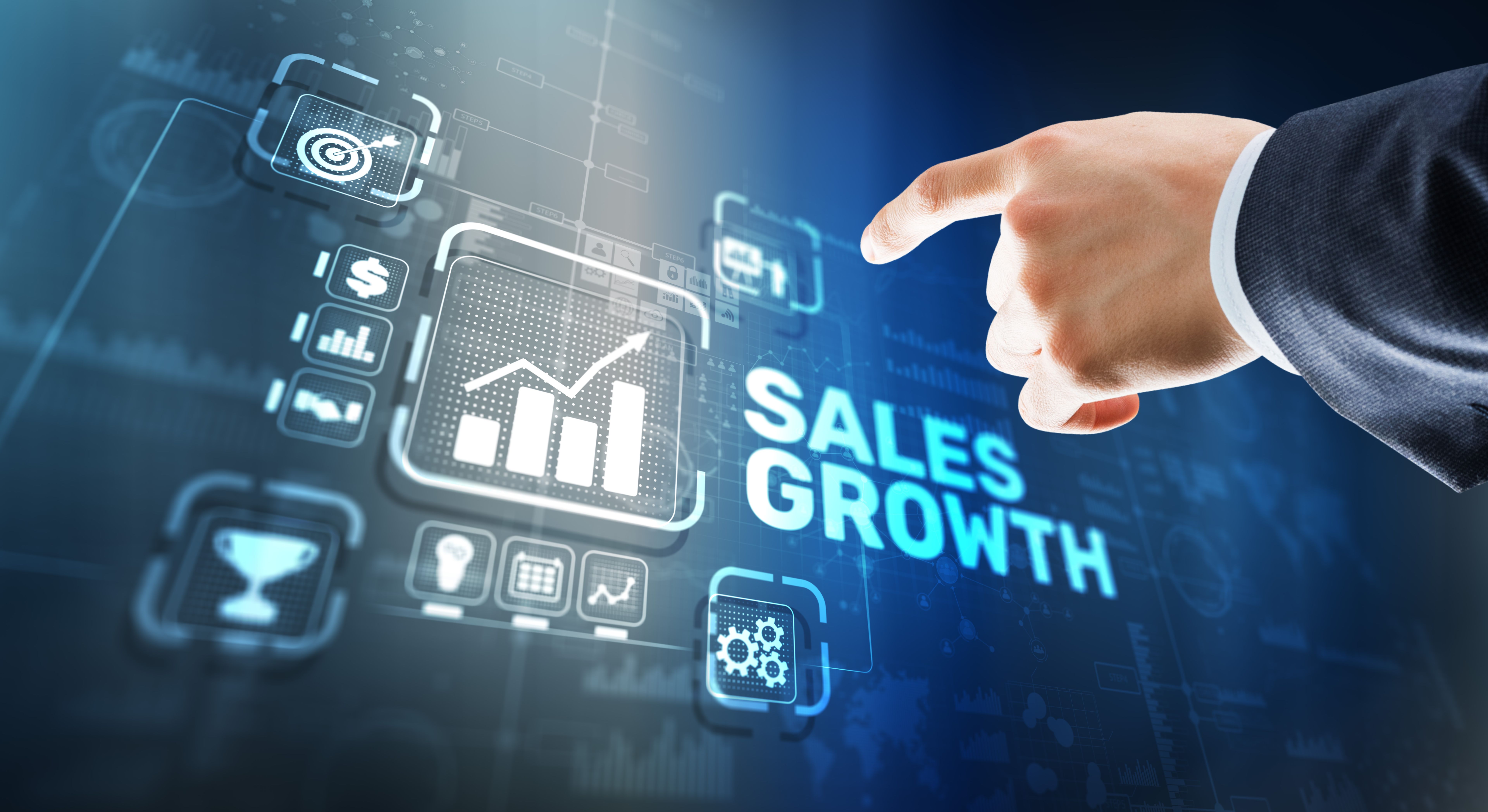 Sales Growth Man clicks inscription on virtual 3D screen