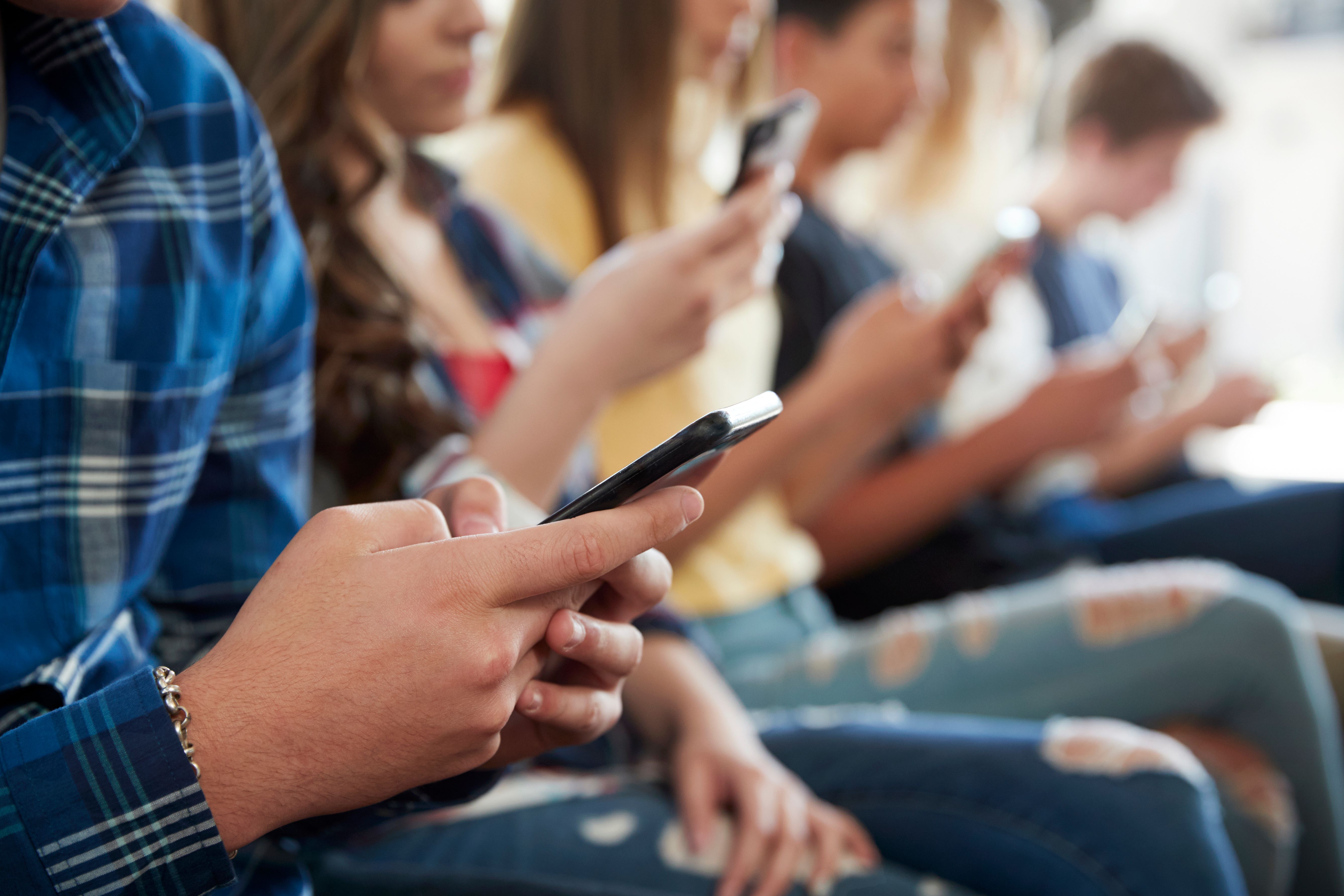 students using phones