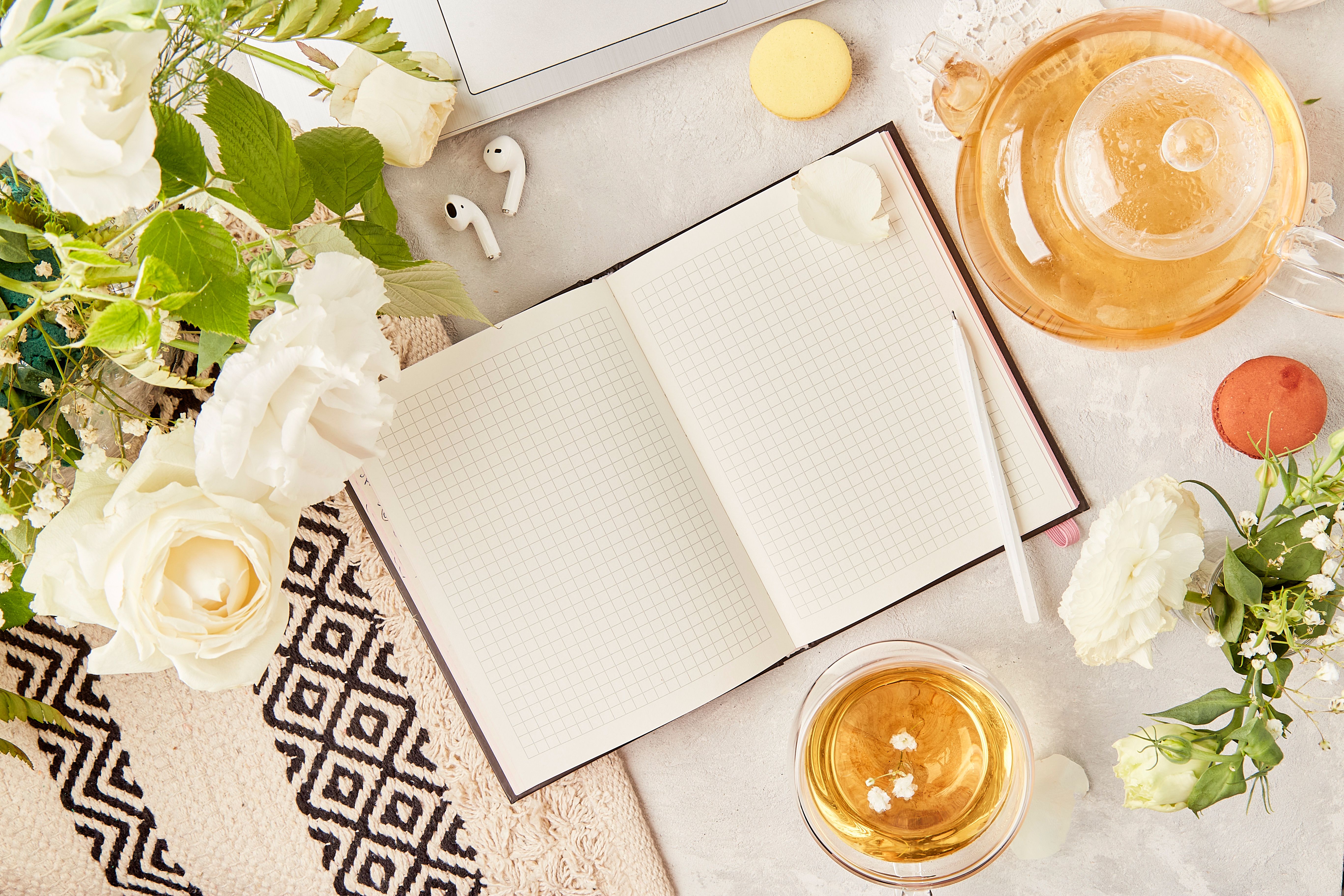 Open notebook mock up, herbal tea. Aesthetic tea time, feminine meditative lifestyle in biophilic interior, cozy home. Copy space Open notebook mock up, herbal tea. Aesthetic tea time, feminine meditative lifestyle in biophilic interior, cozy home. Copy space