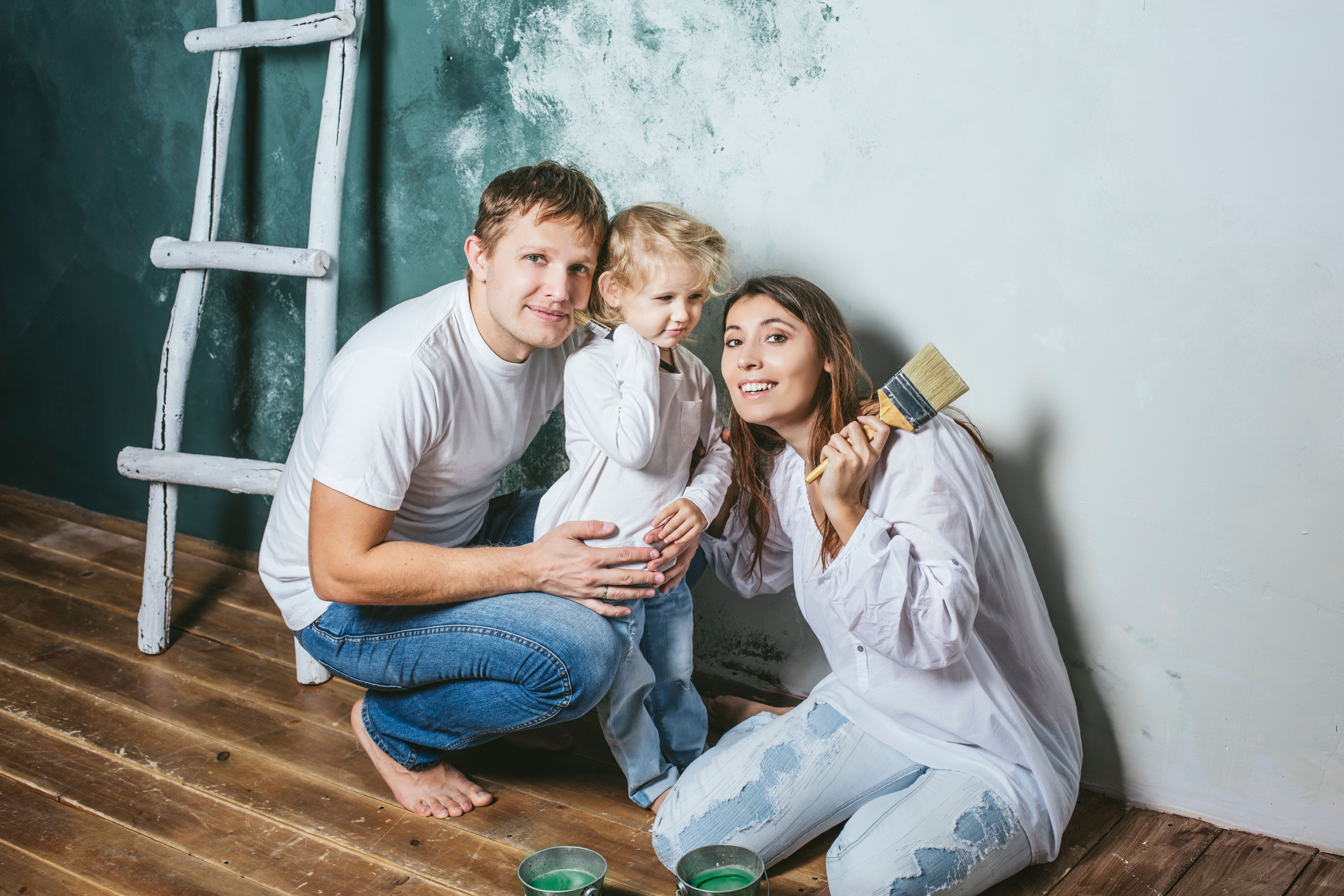 family painting walls