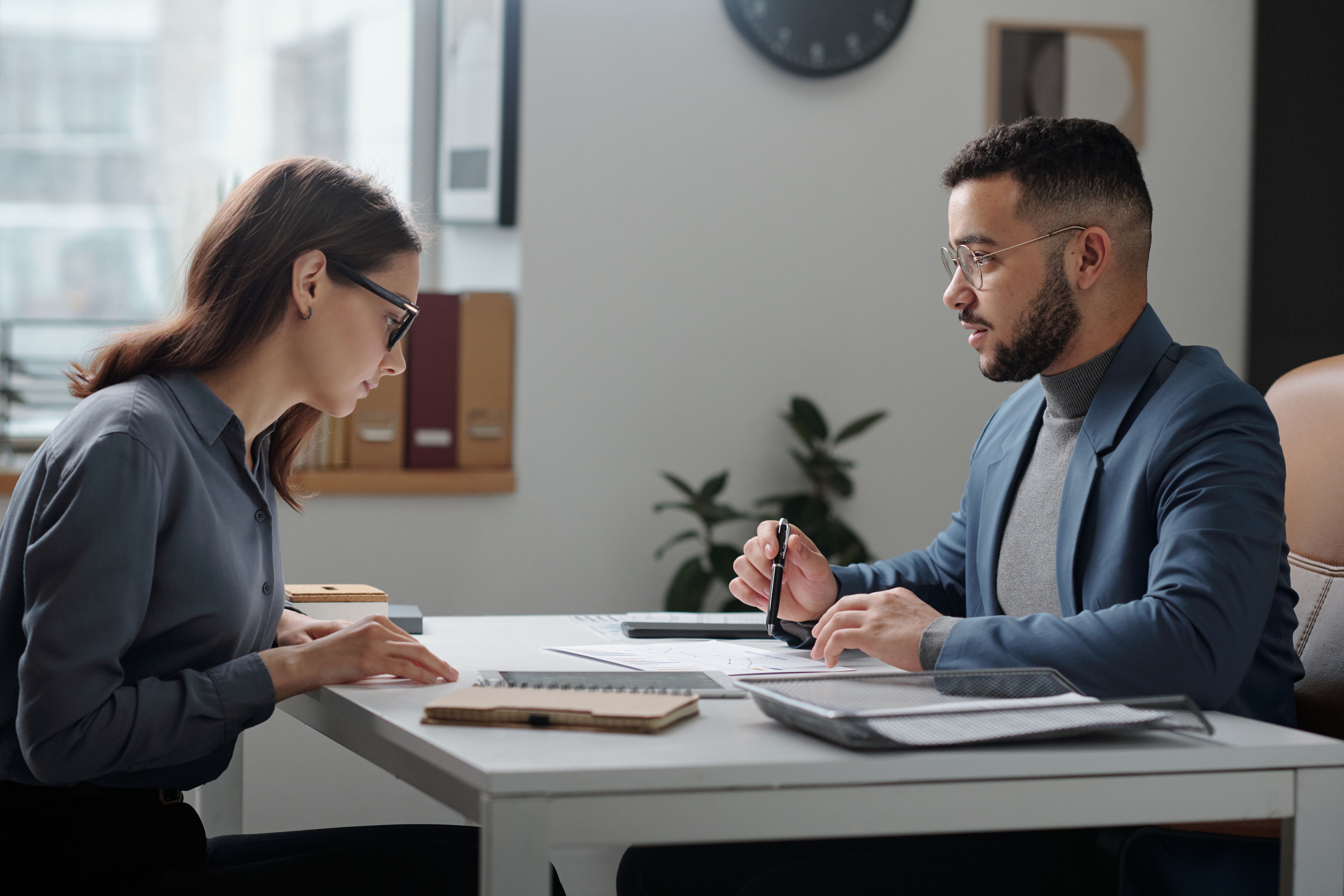 Manager in Meeting with Female Employee
