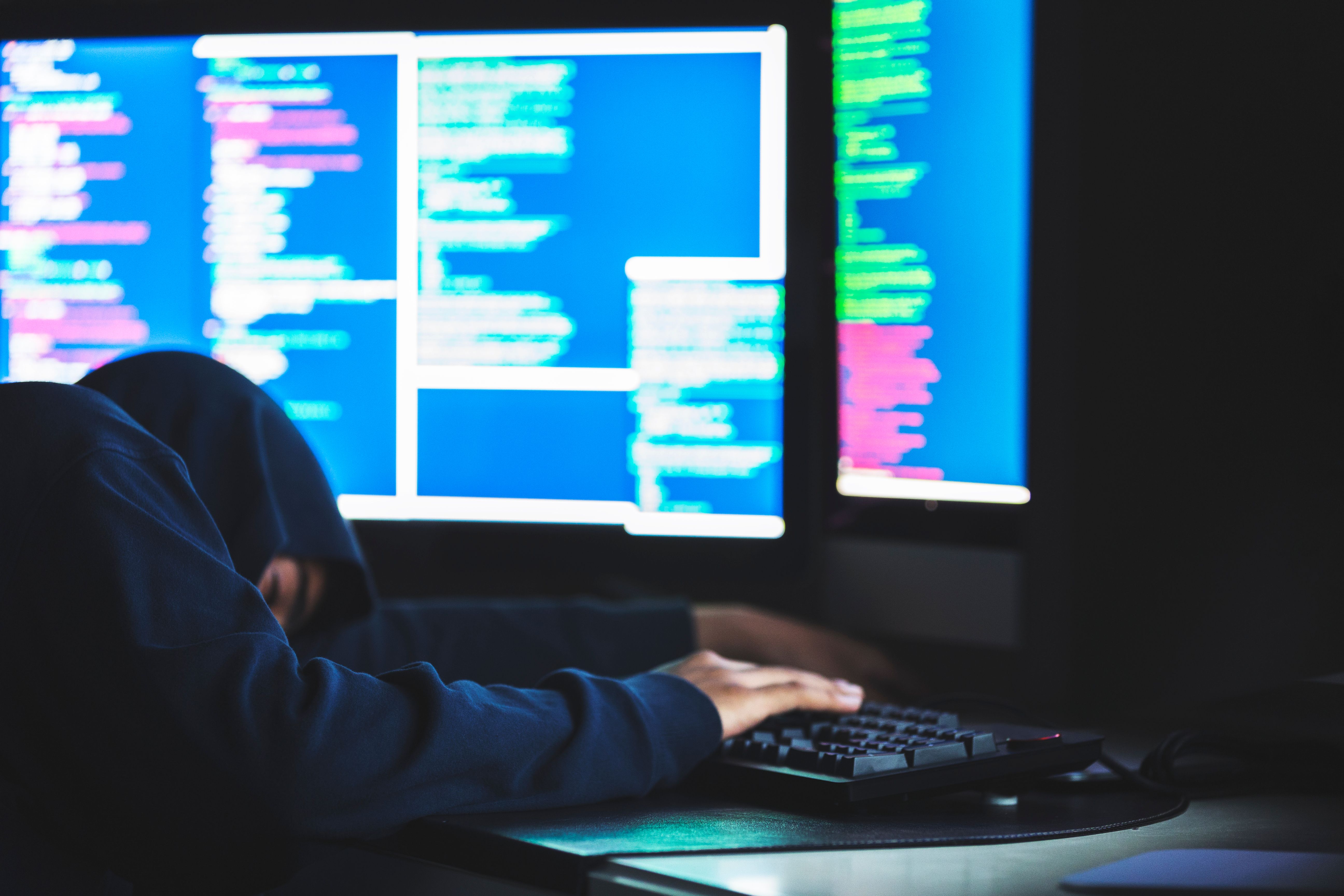 Student sleeping on his desk after working late on his computer programs Student sleeping on his desk after working late on his computer programs