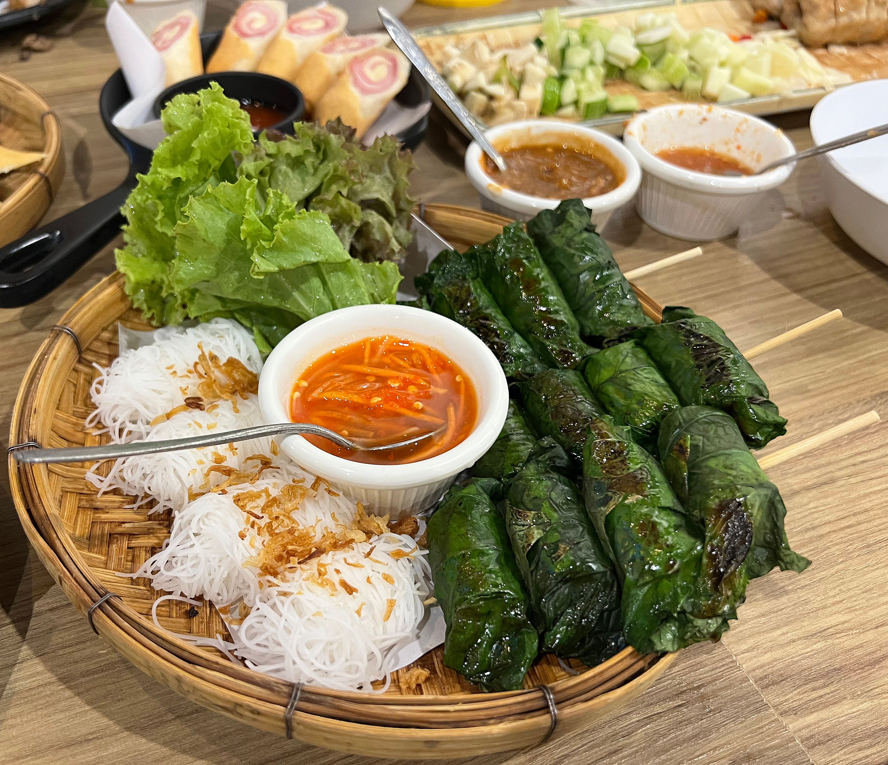 Grilled Pork in Betel Leaves Served with Rice Vermicelli in Vietnamese Style