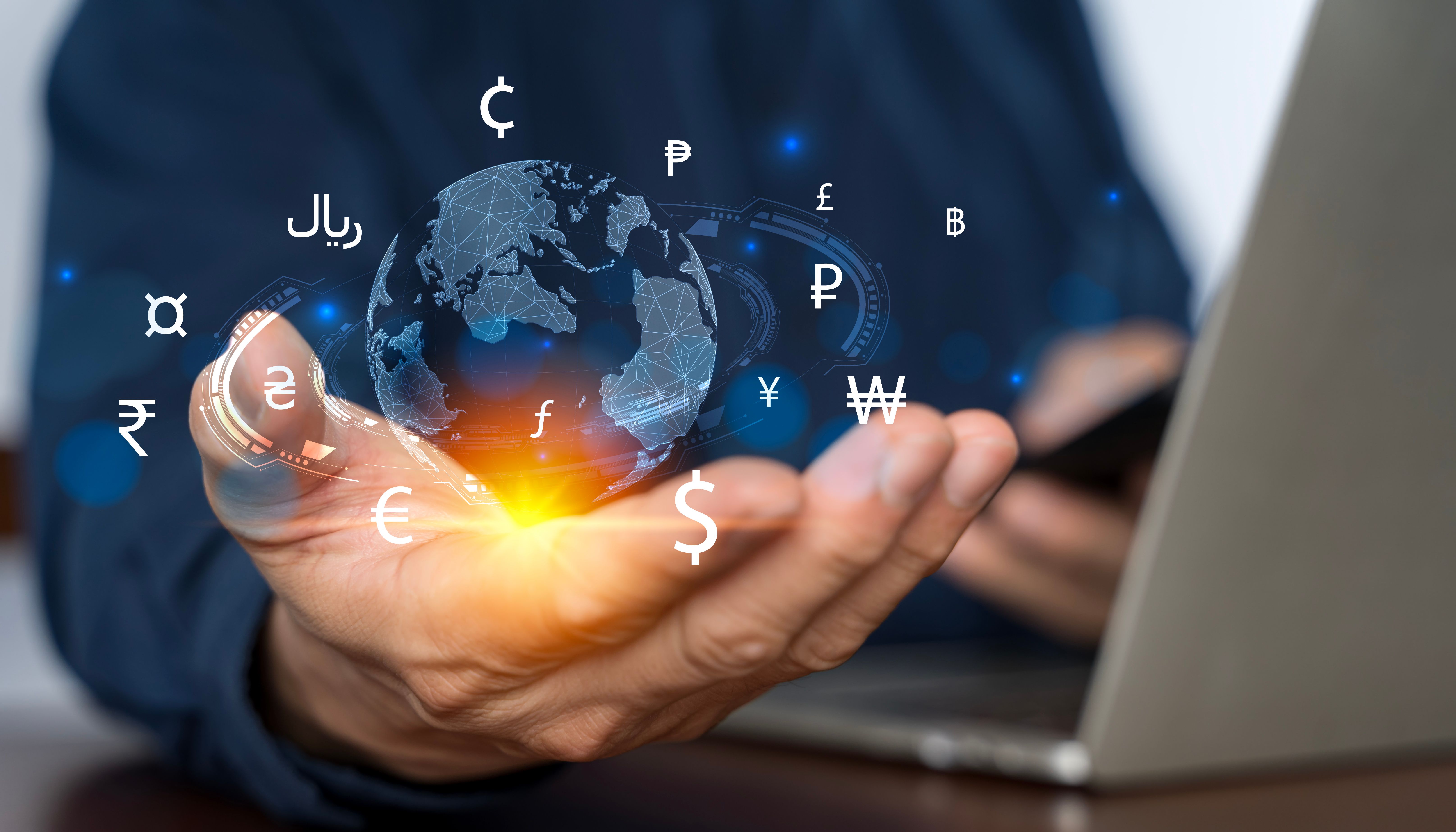 Online banking interbank payment concept. Businessman with virtual global currency symbols in hand. Online banking interbank payment concept. Businessman with virtual global currency symbols in hand.