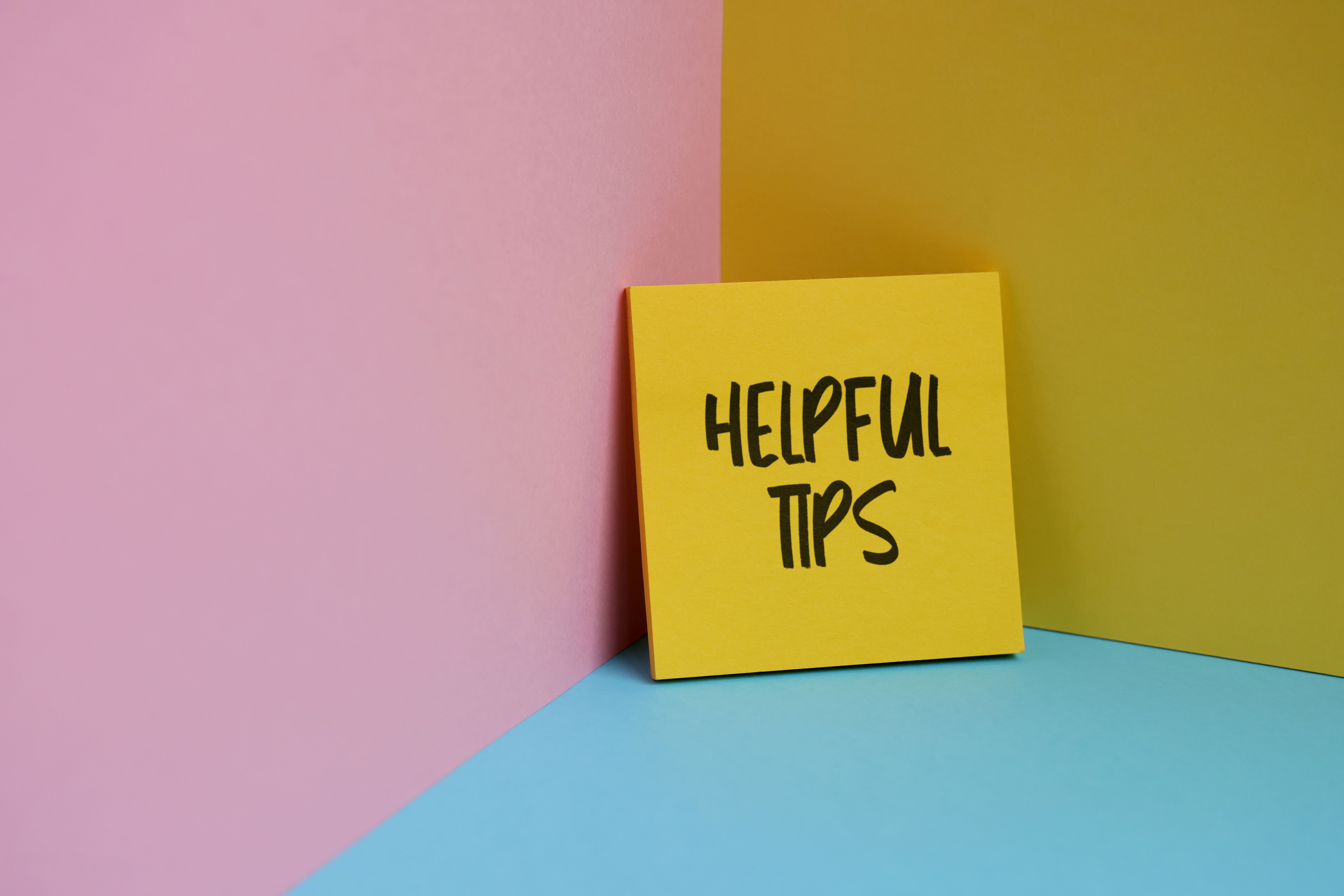 Helpful Tips text on sticky paper Helpful Tips text on sticky paper