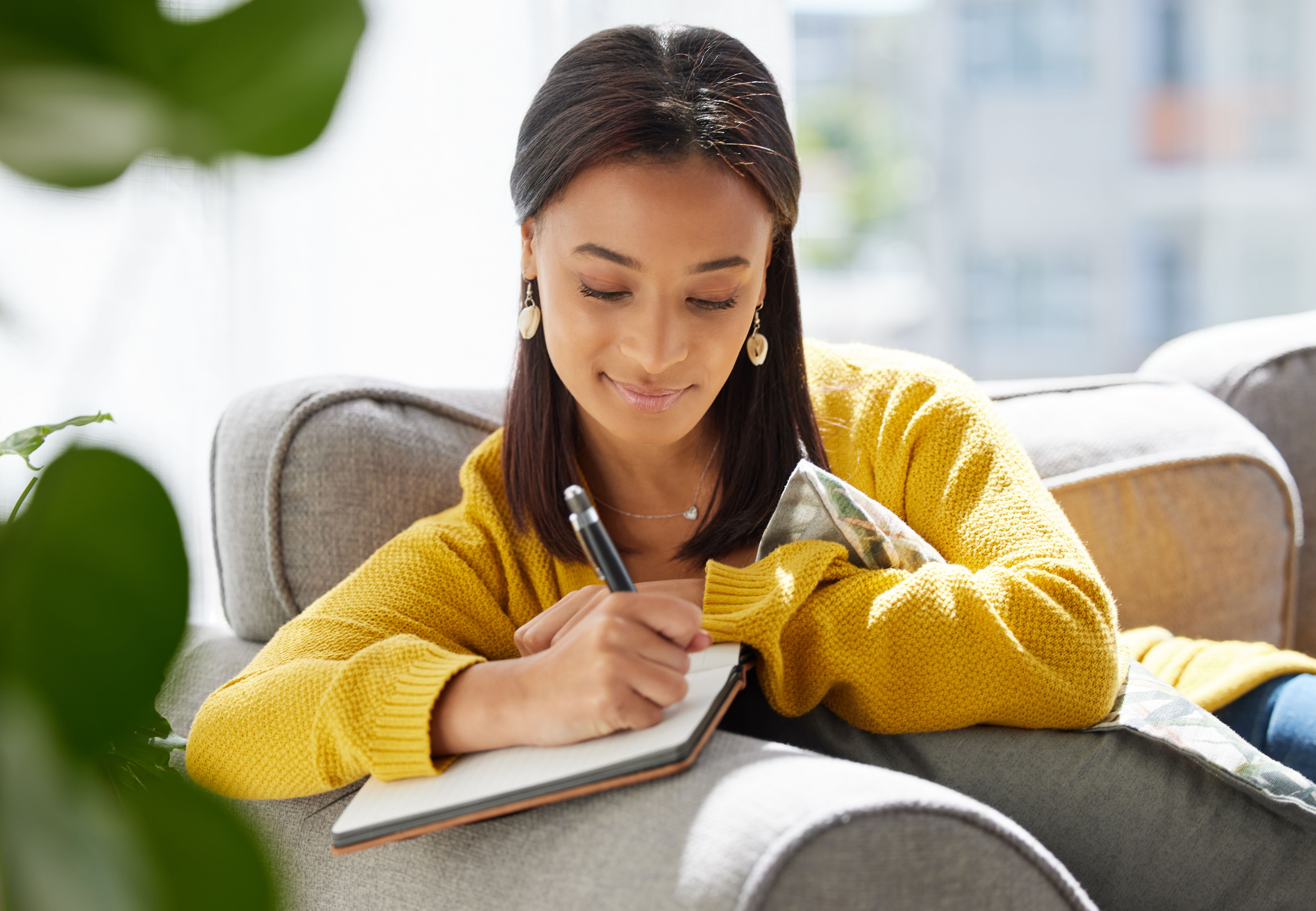 woman writing journal