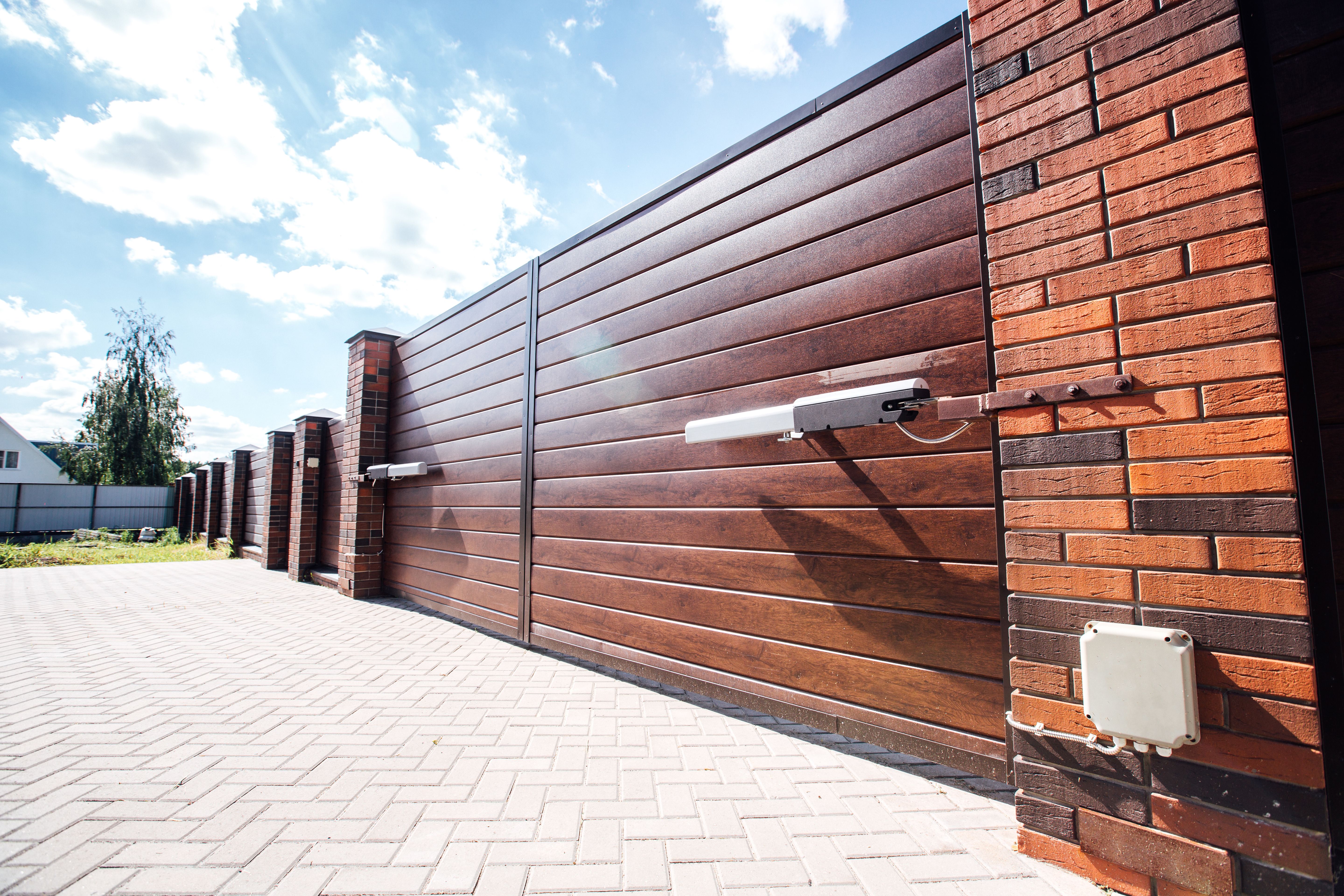 modern fence with automatic gate