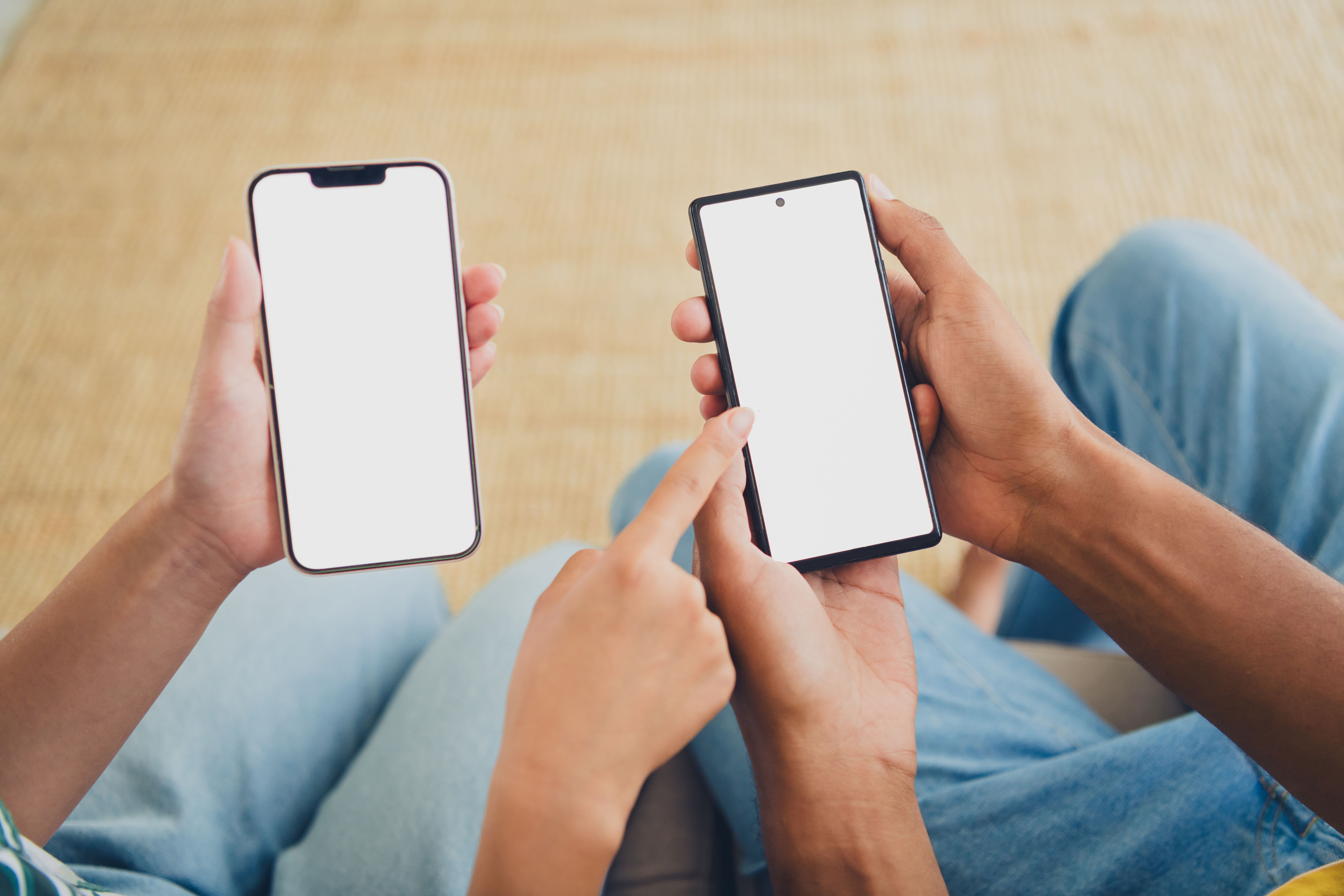 Cropped photo of young people modern technology application web site device shopping from home indoors Cropped photo of young people modern technology application web site device shopping from home indoors