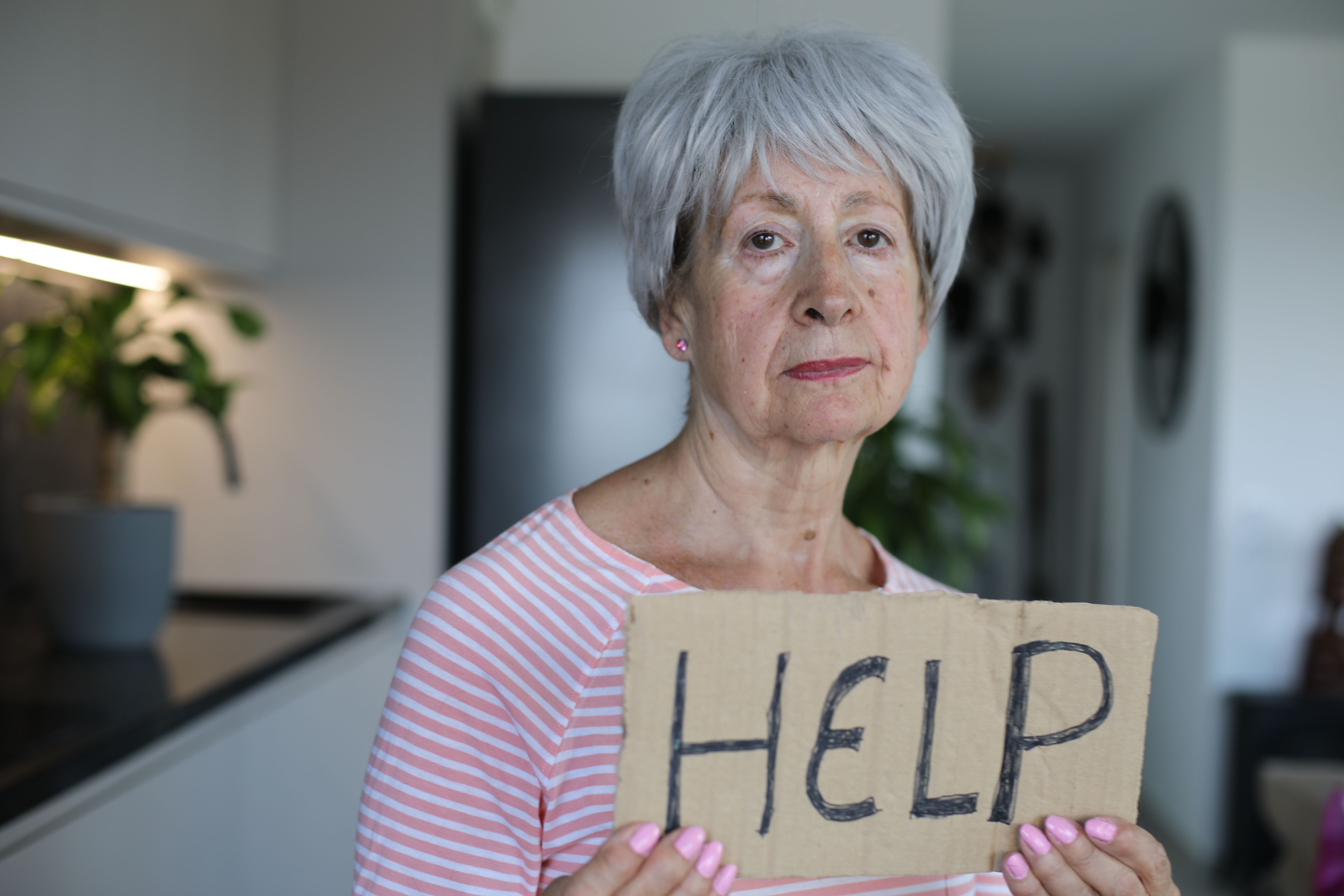 Senior woman asking for help Senior woman asking for help
