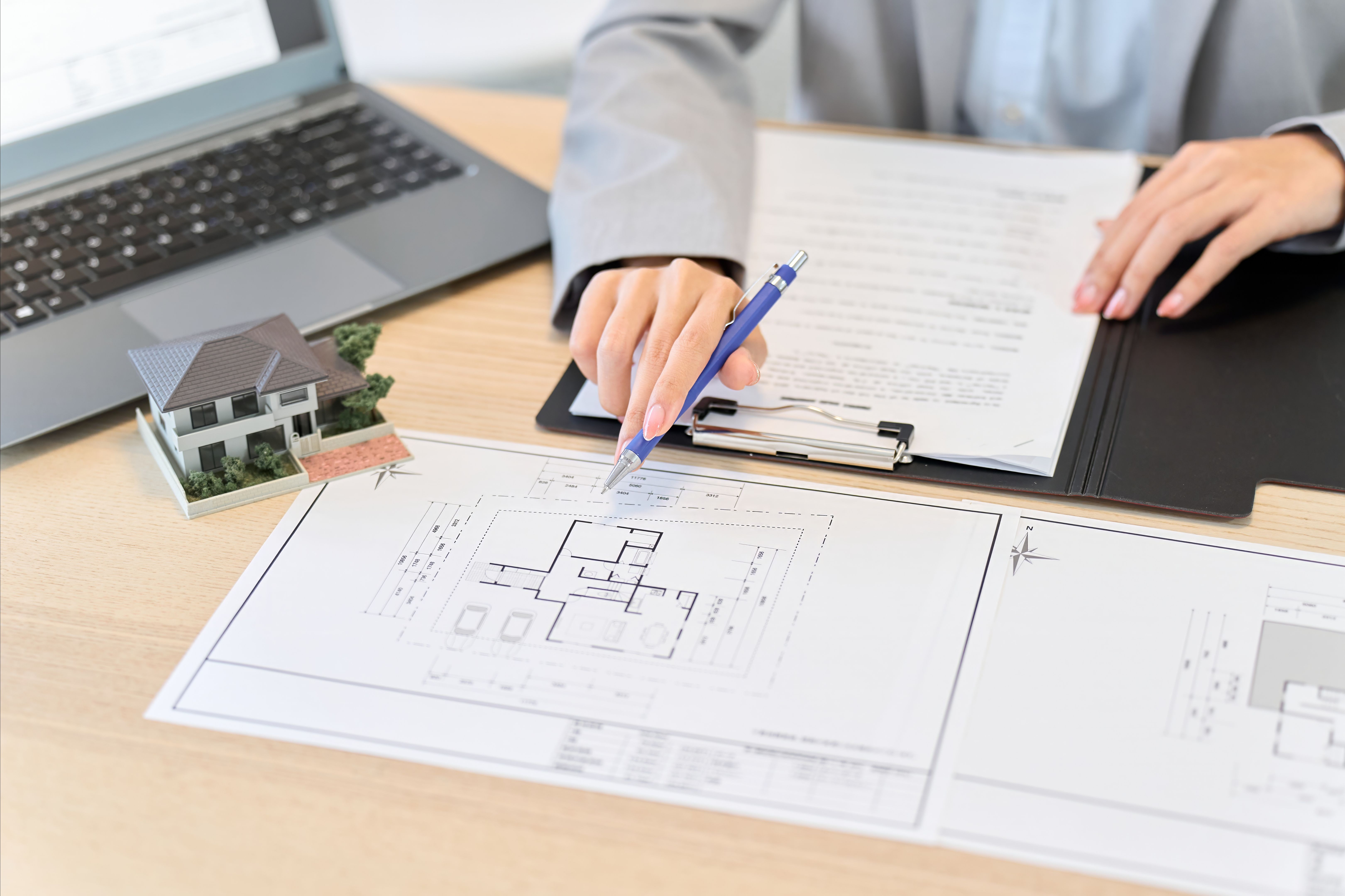 Female salesperson providing real estate information