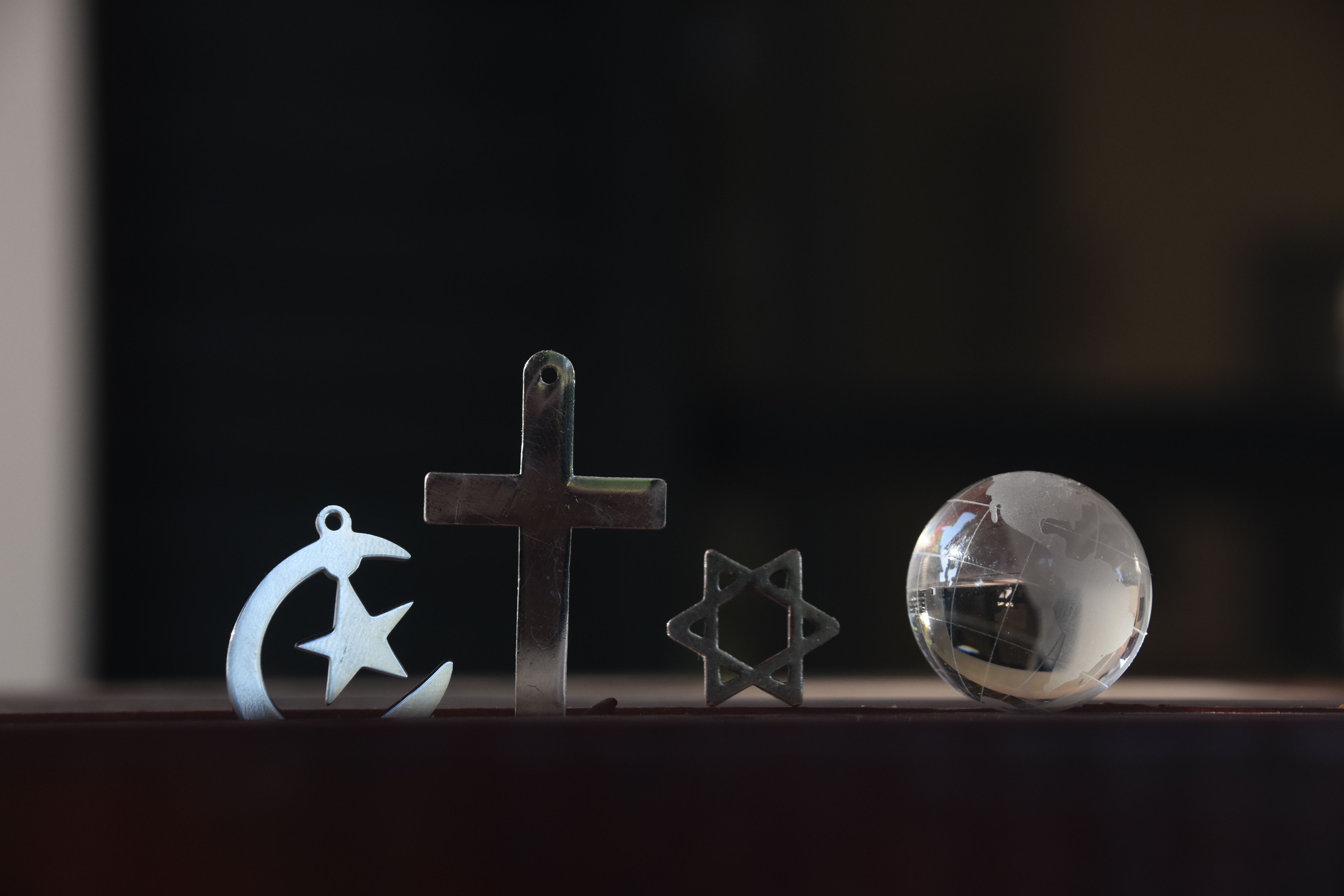 Symbols of the three religions - Judaism, Christianity and Islam With a crystal ball Symbols of the three religions - Judaism, Christianity and Islam With a crystal ball
