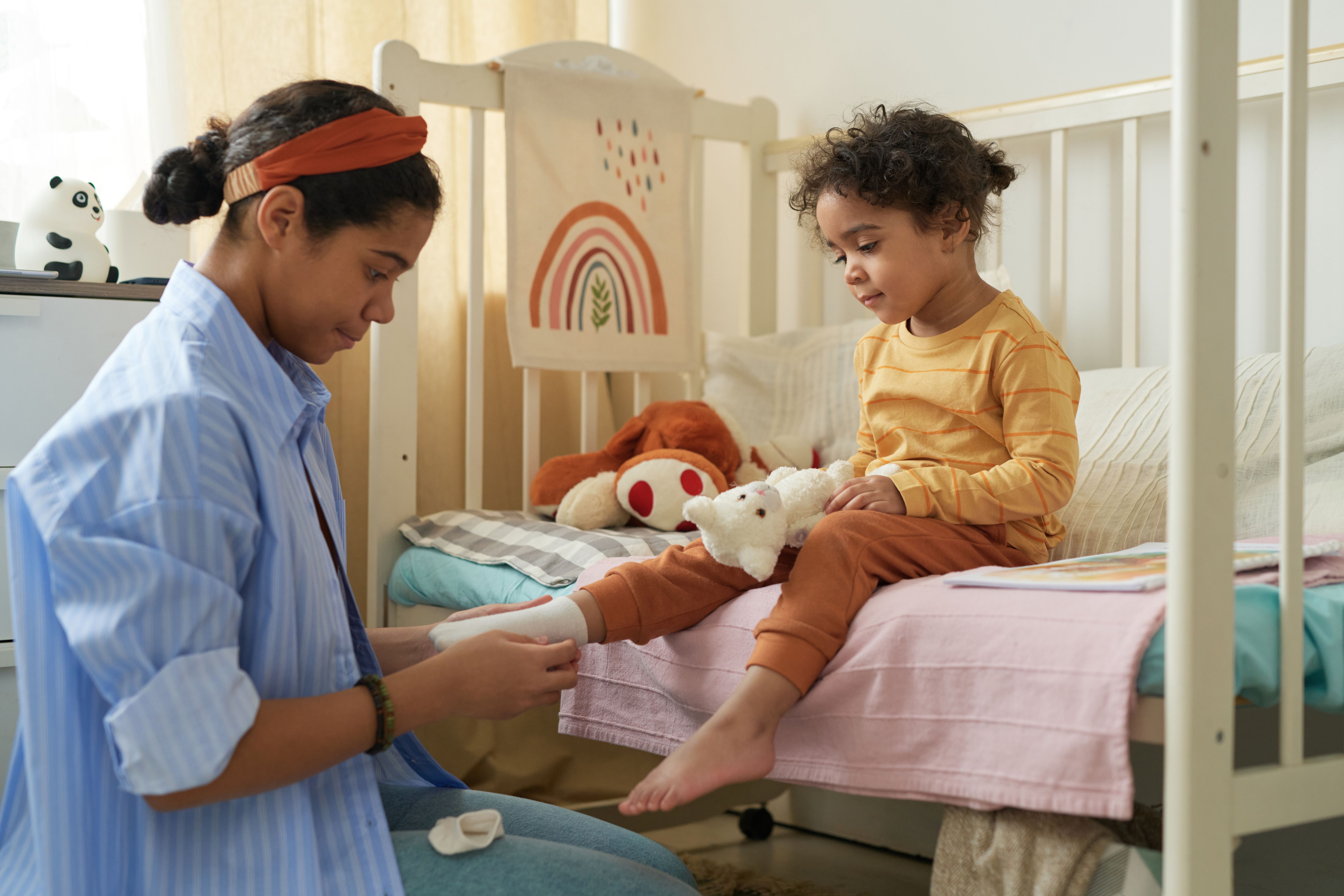 nanny caring for child