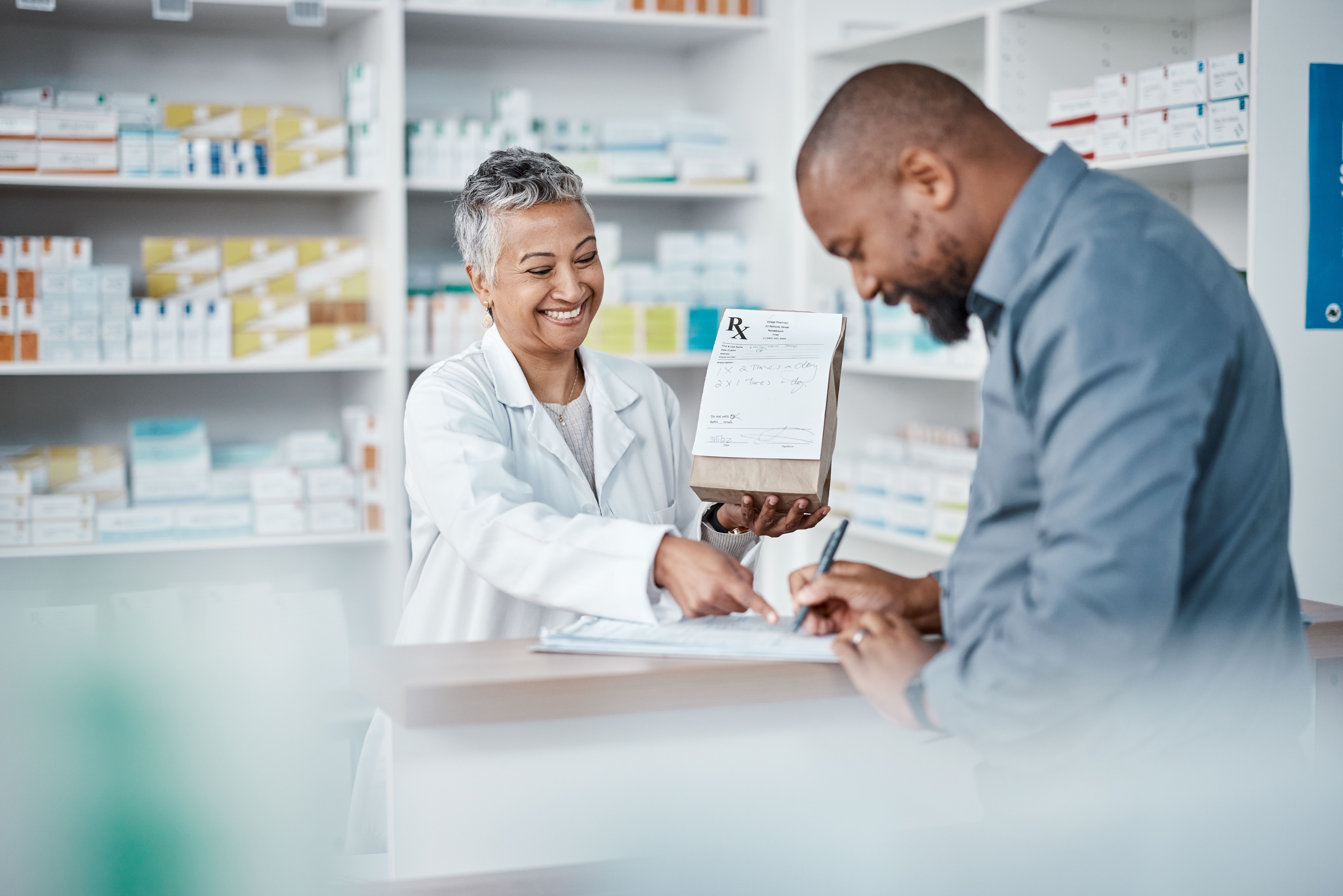 pharmacist helping customer