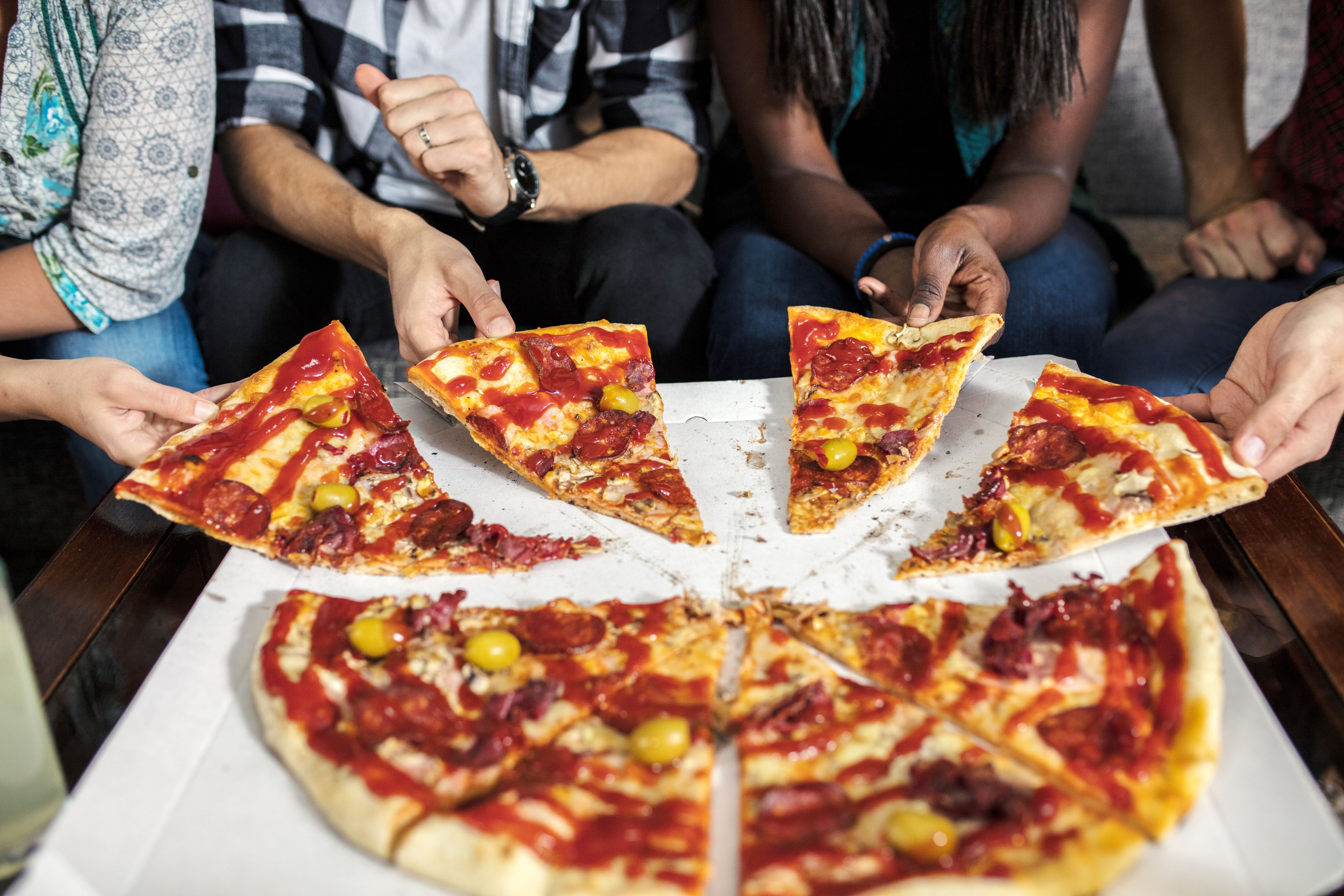 group eating pizza