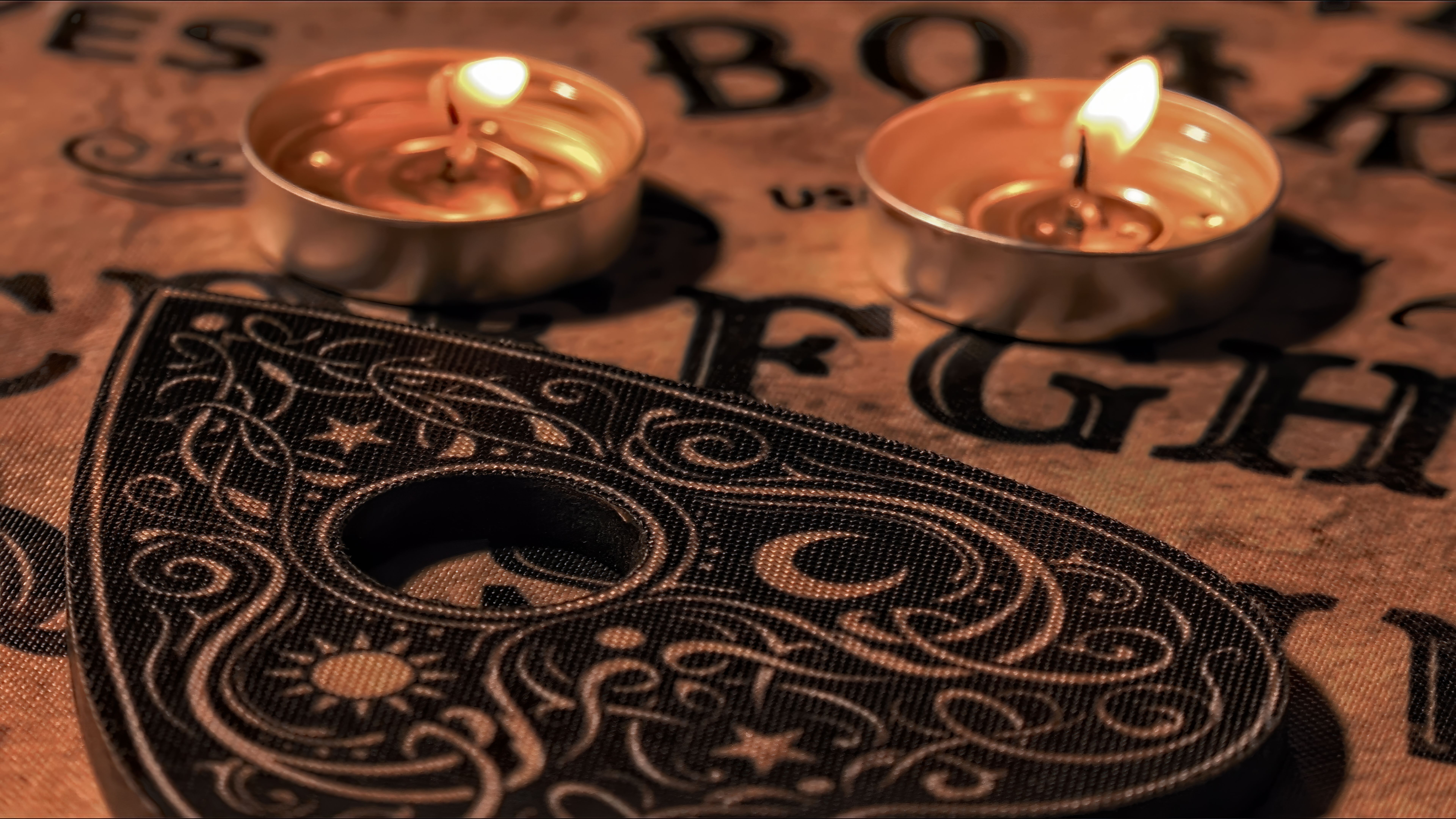 Witchcraft Spiritual Game Ouija Board and Fire