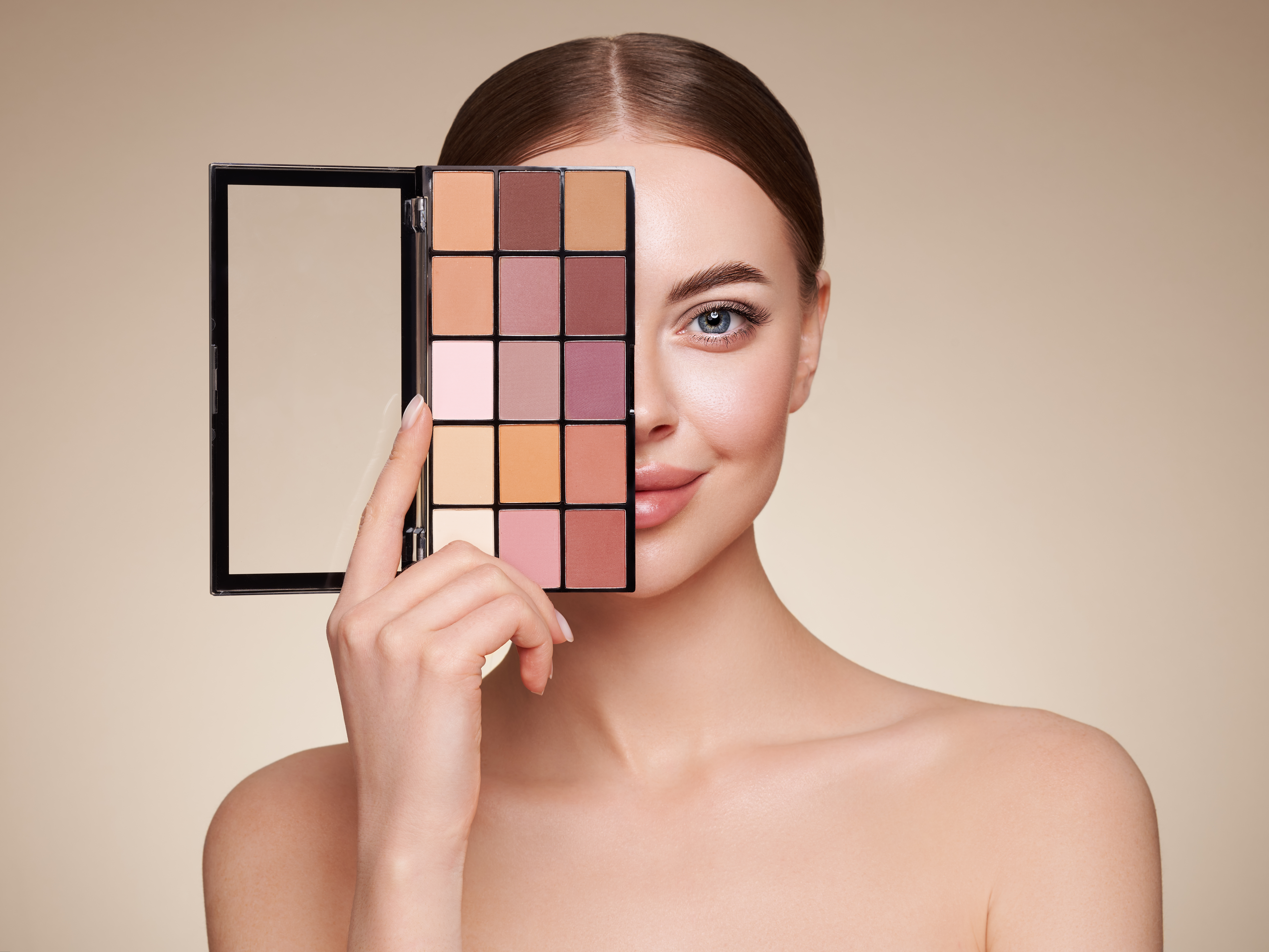 Beauty woman with eye shadow makeup palette Beauty woman with eye shadow makeup palette