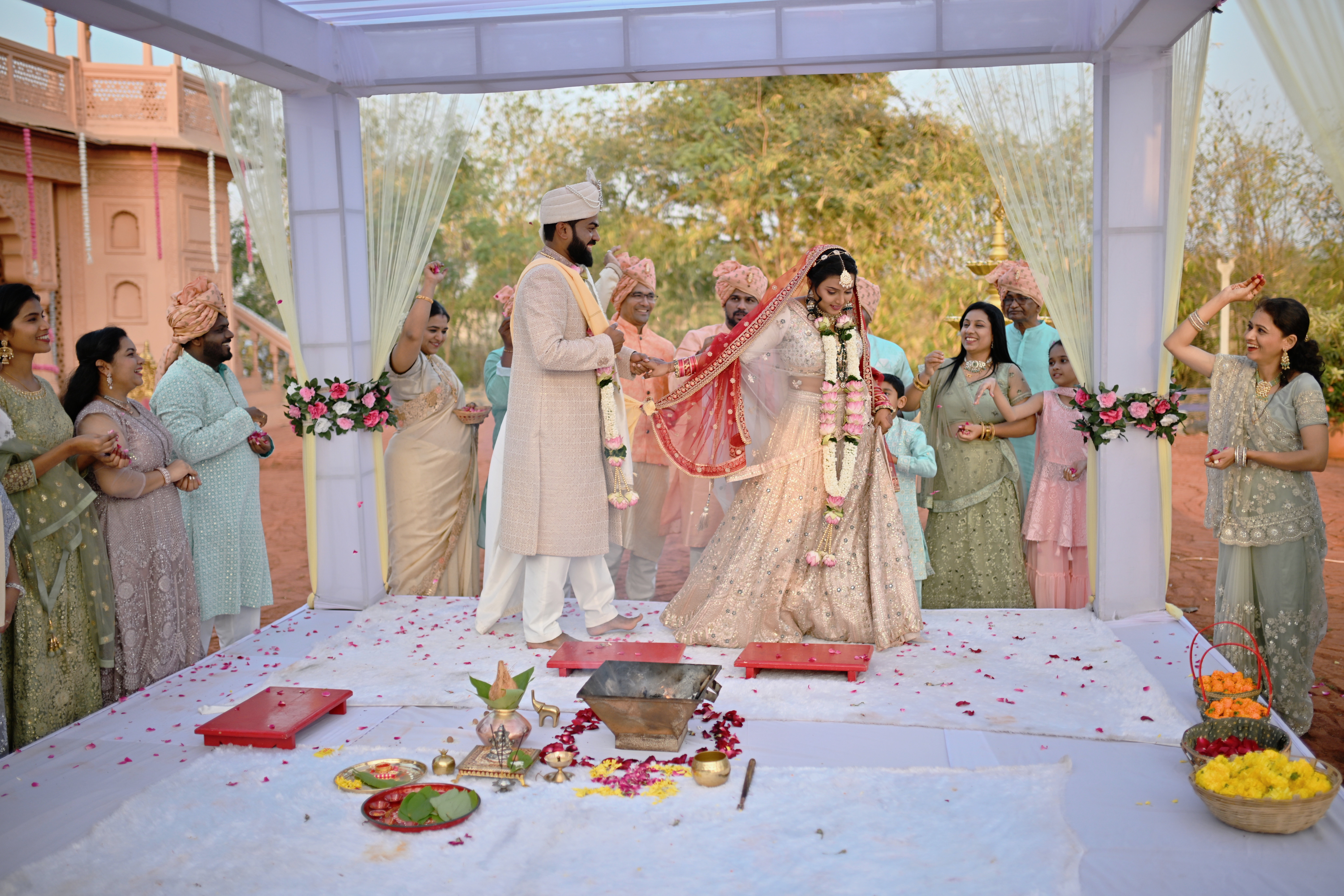 Indian newlyweds taking circles around the sacred fire (agni) known as Saptapadi during their Hindu wedding ceremony