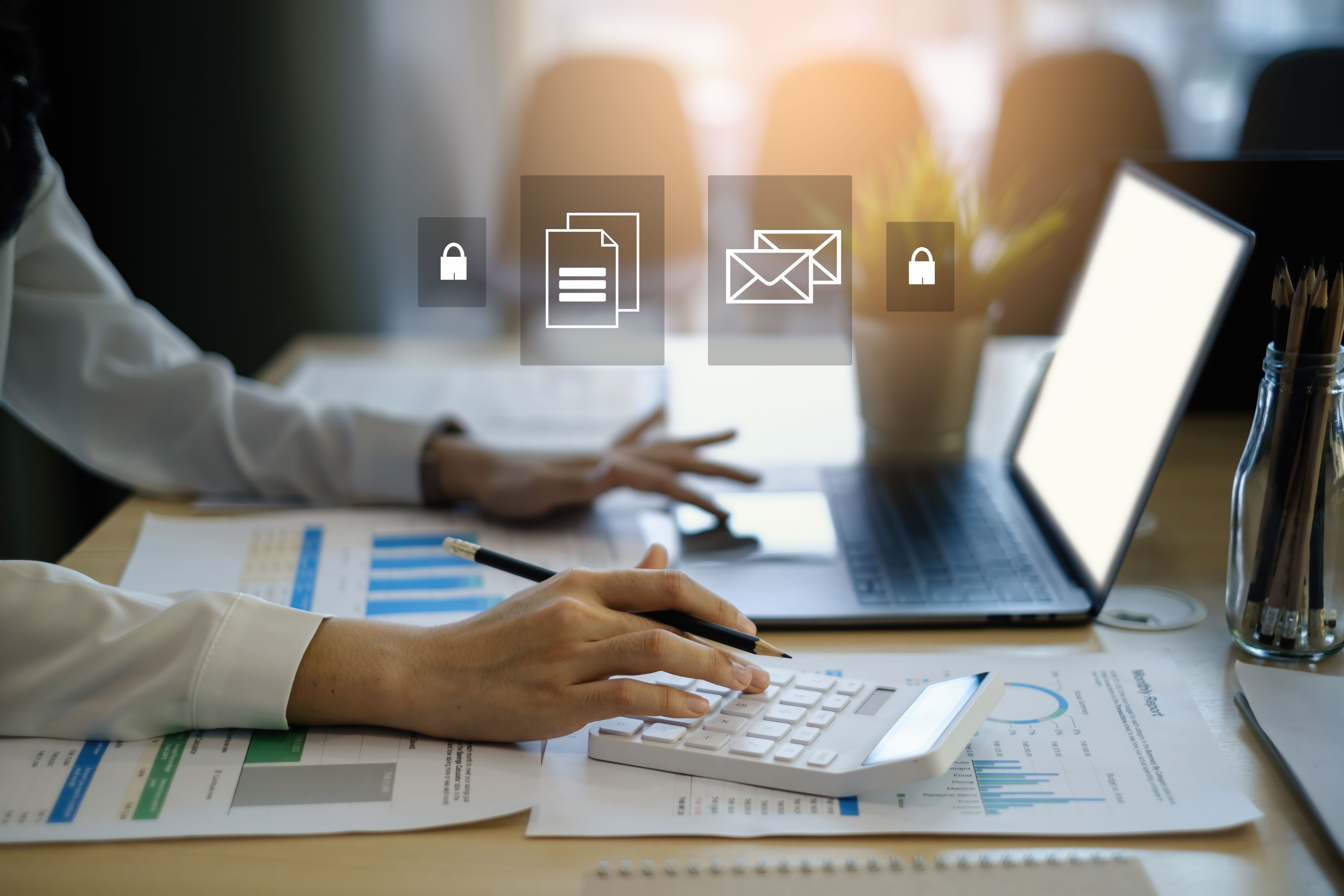 Close up of business woman busy calculating finances or taxes on calculator. Work From Home concept.