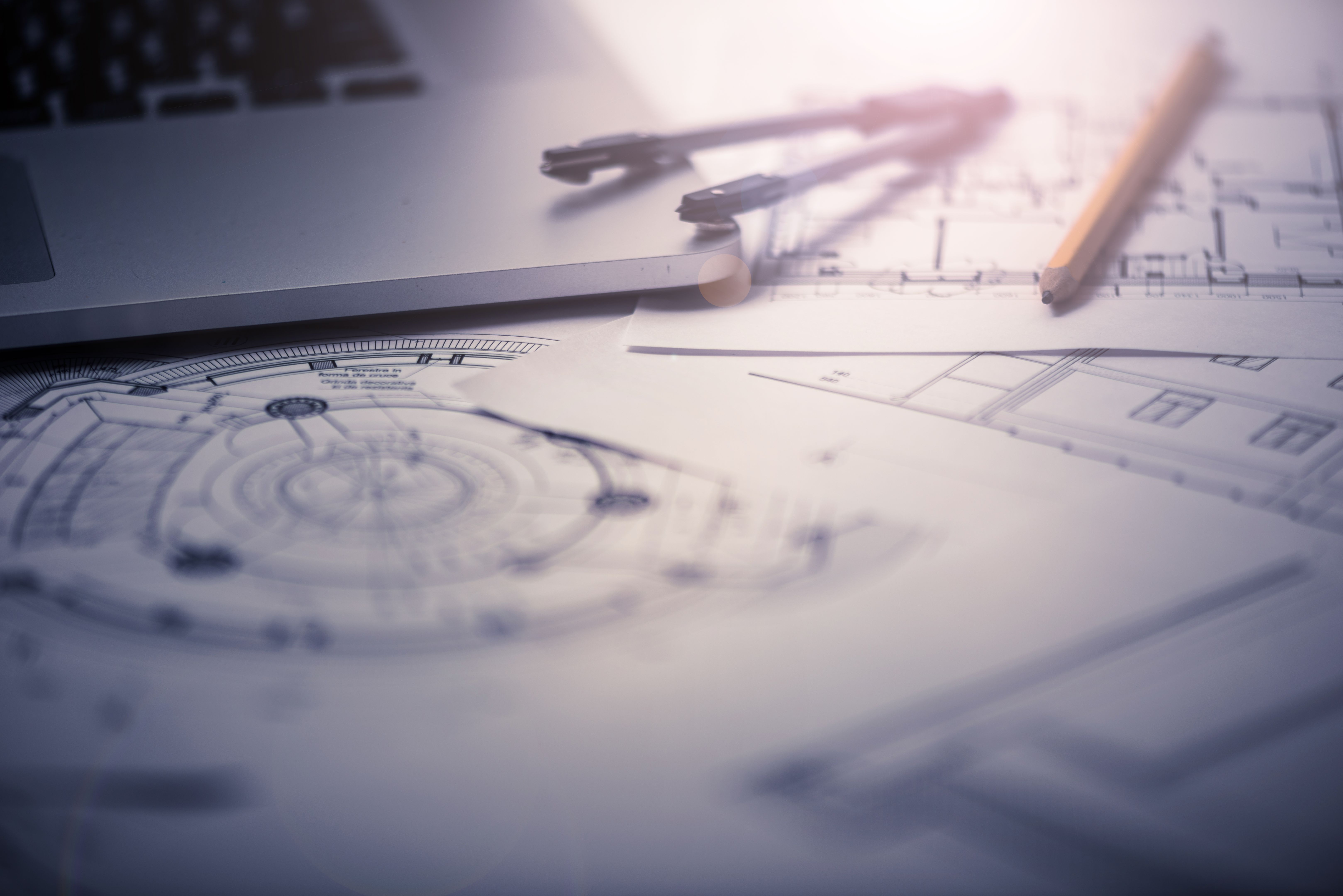 Architectural blueprints on architect’s desk