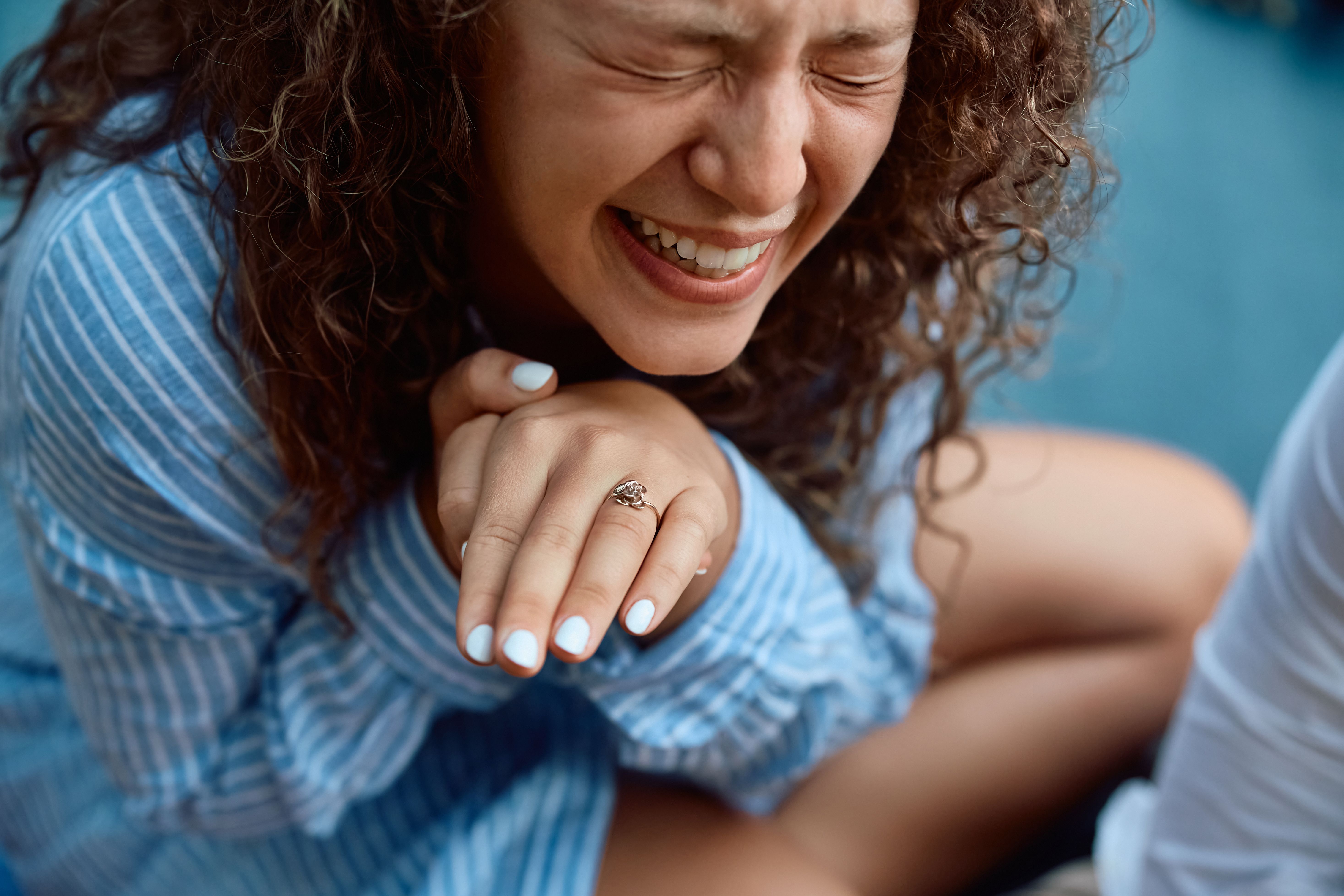 Young woman feeling emotional after getting engaged. Young woman feeling emotional after getting engaged.