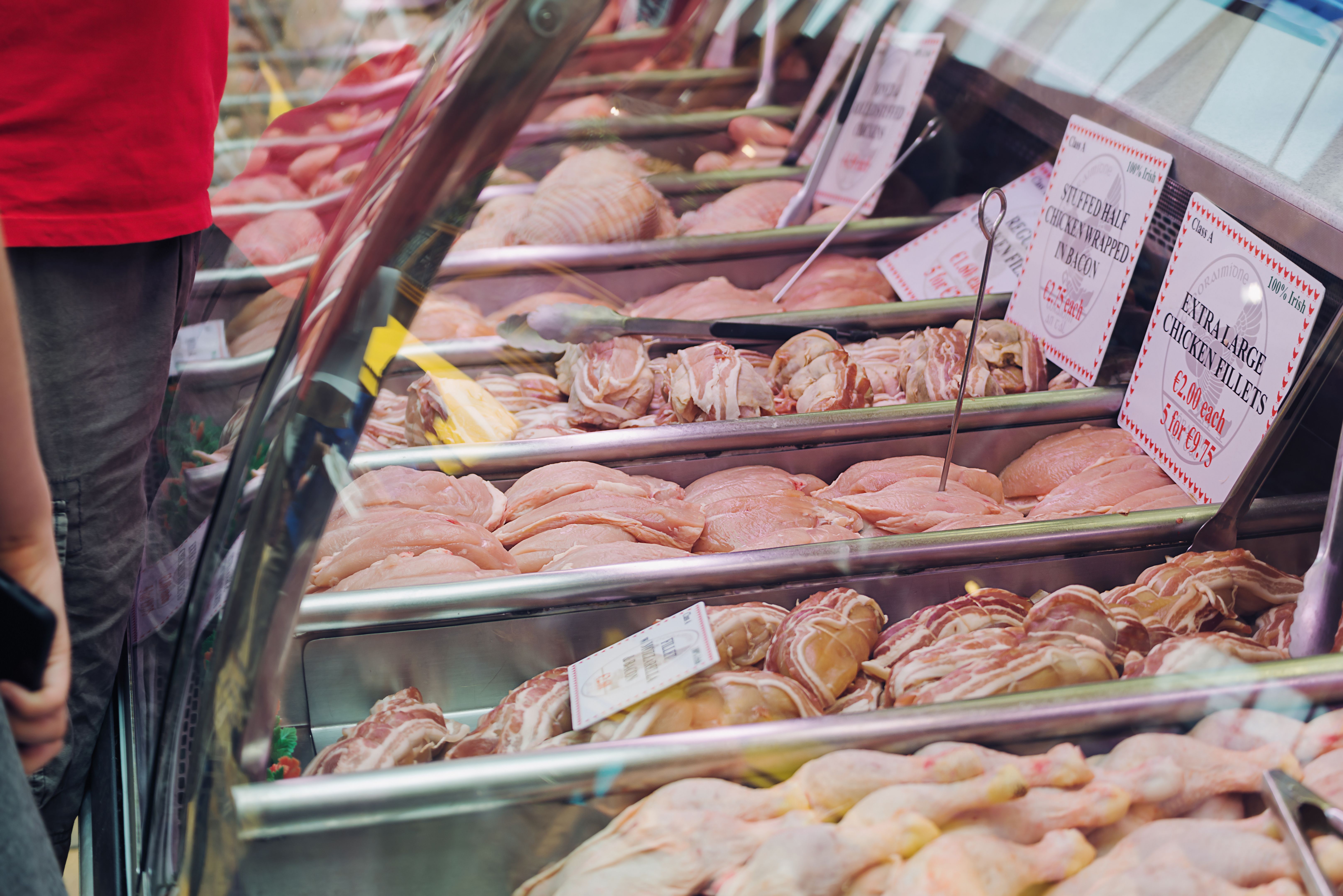 English Market stand selling chicken fillets - Cork, Ireland English Market stand selling chicken fillets - Cork, Ireland
