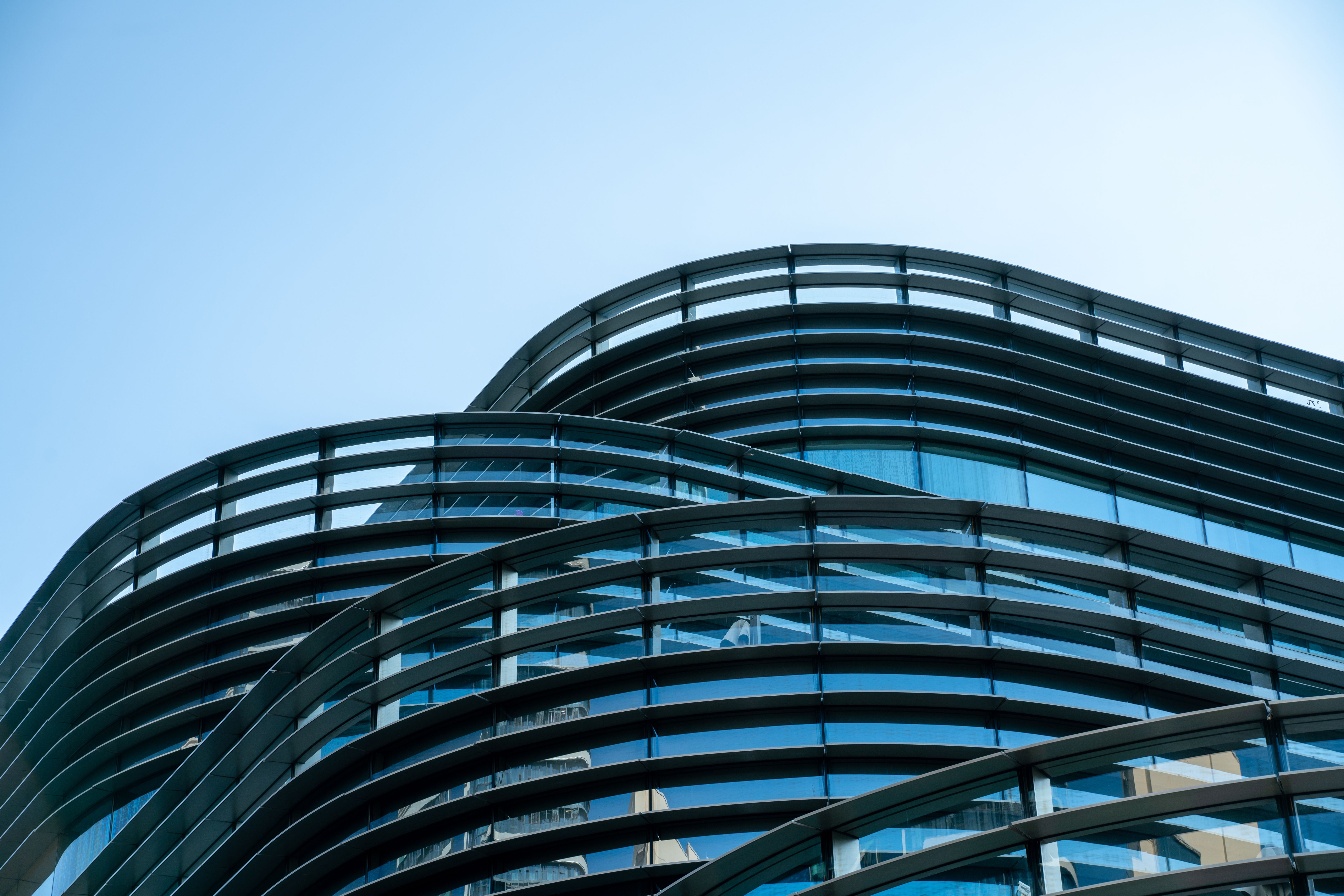 edge of modern building exterior with sky.