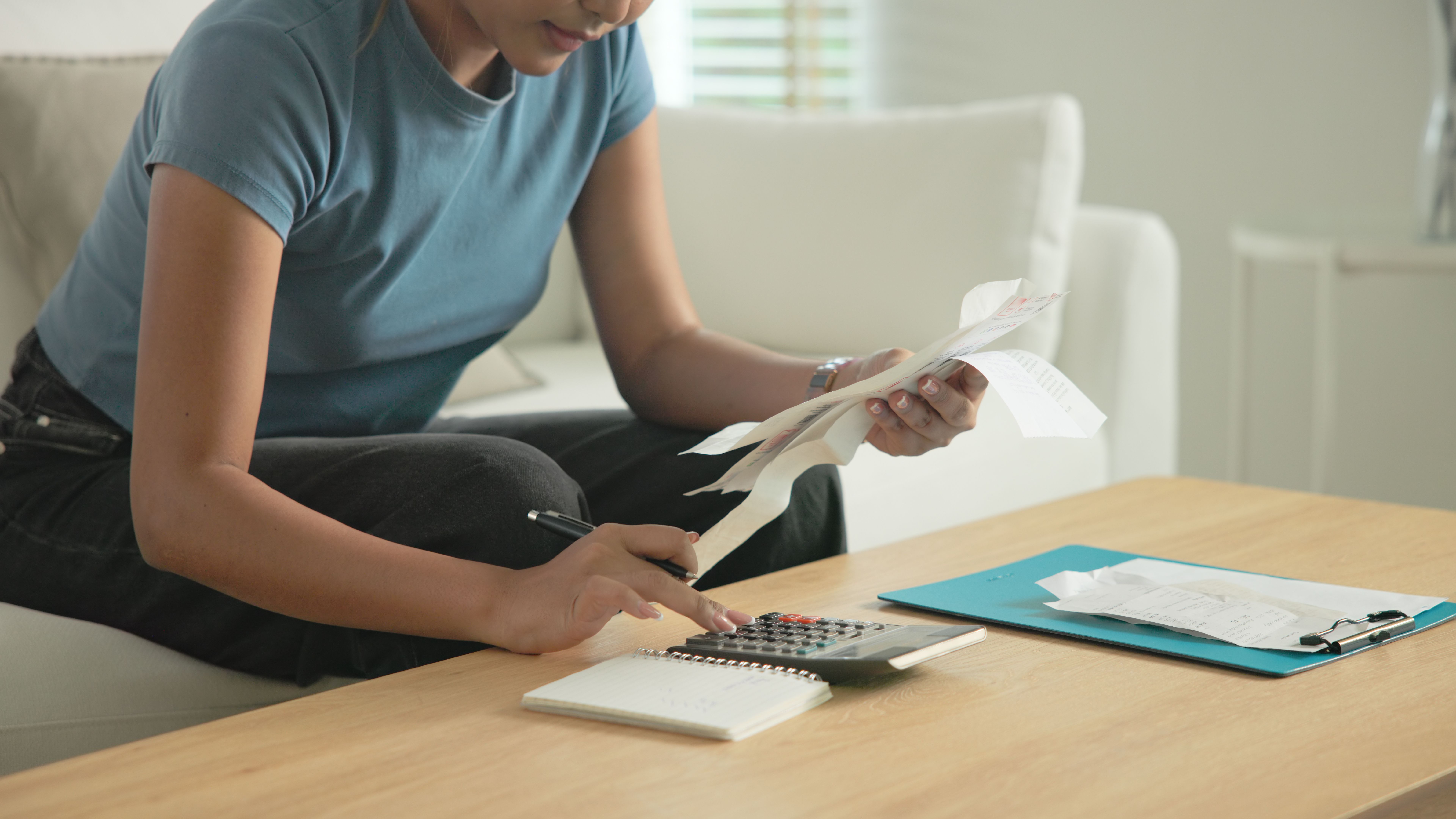 Cost of living income expense saving budget in black asia people Gen Z young adult woman. Looking credit card bill debt home loan money paying happy asian female healthy wealth care goal plan tracking