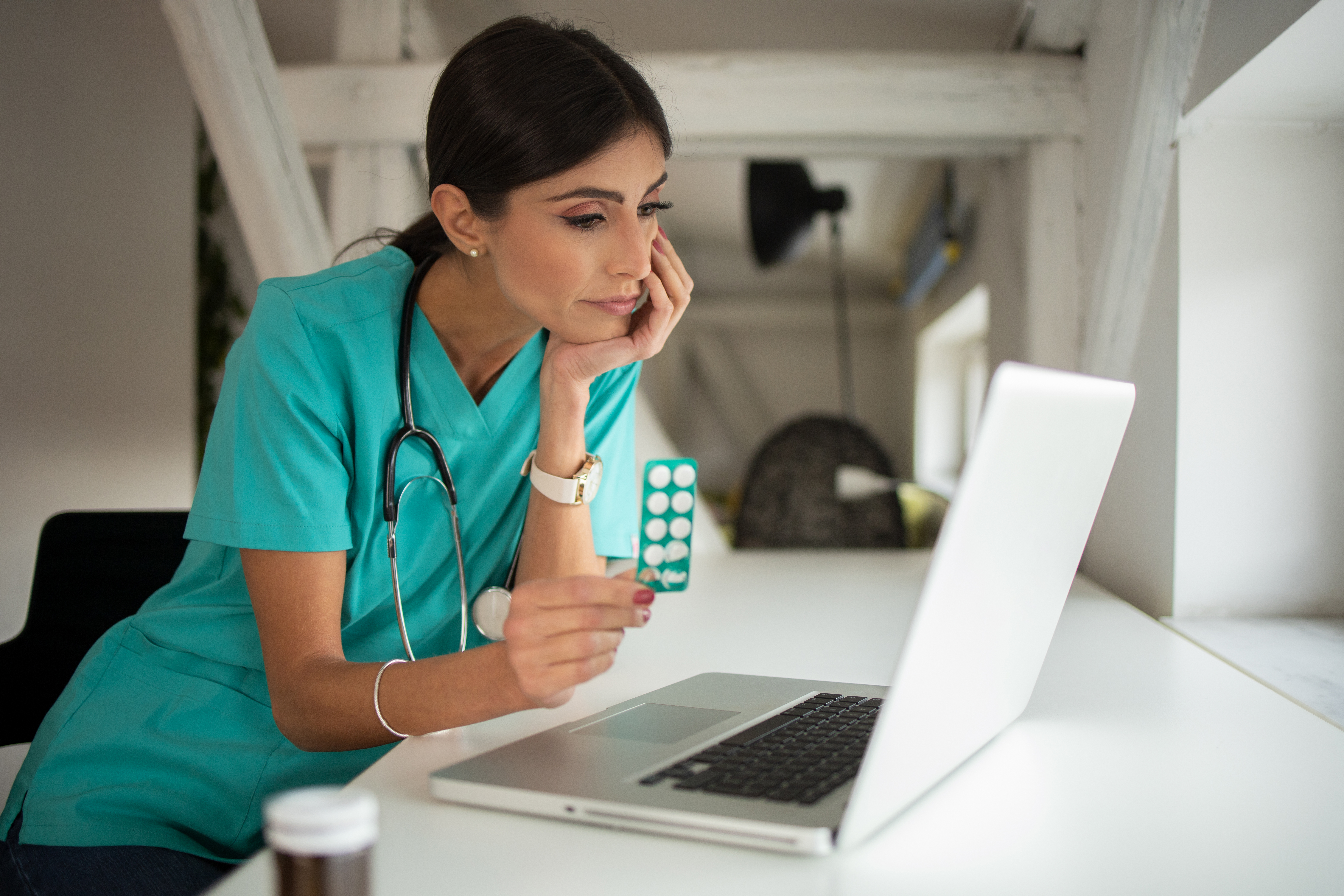Female doctor making video call