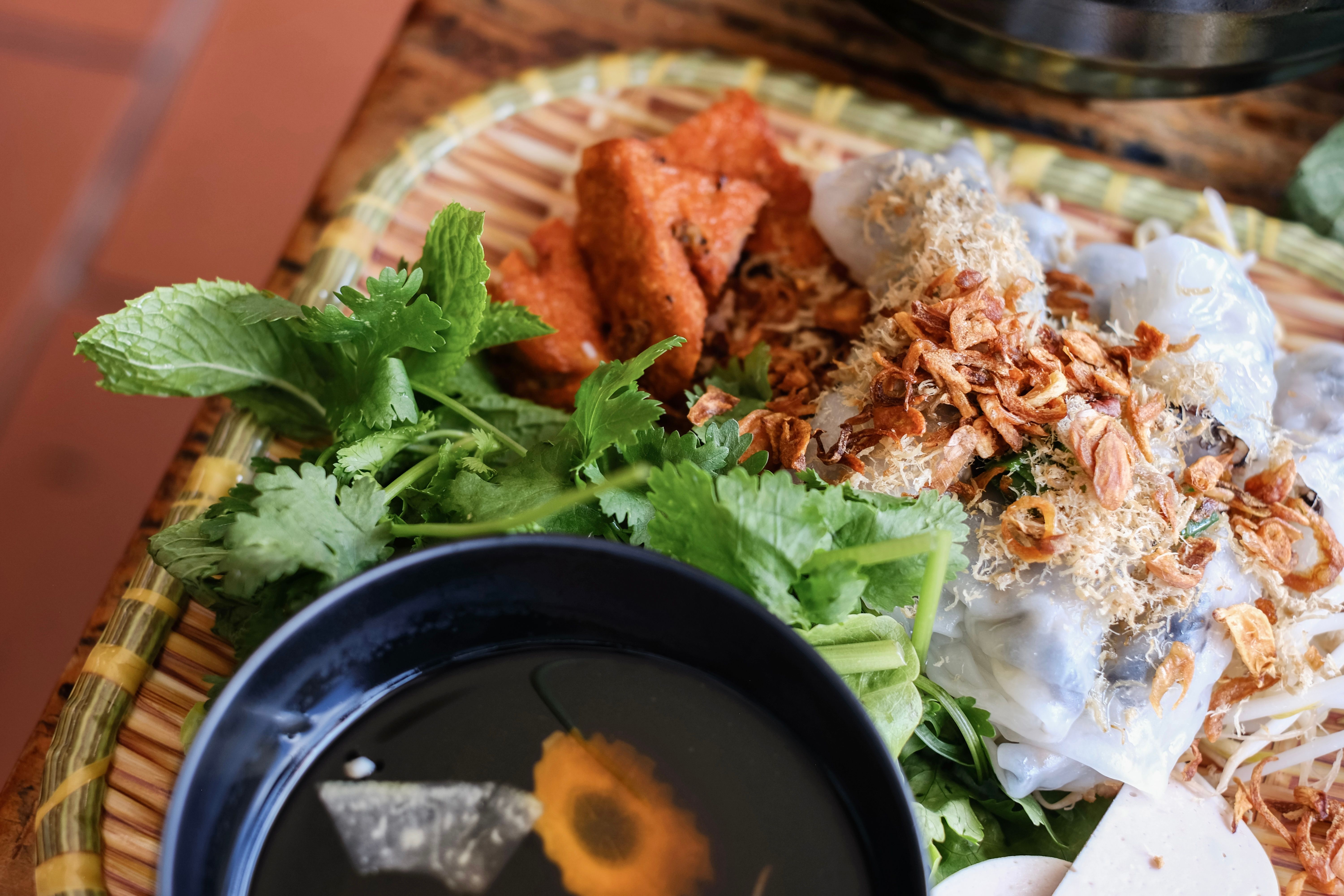North Vietnamese banh cuon (rice noodle rolls) with cha lua sausages at a restaurant in Sydney