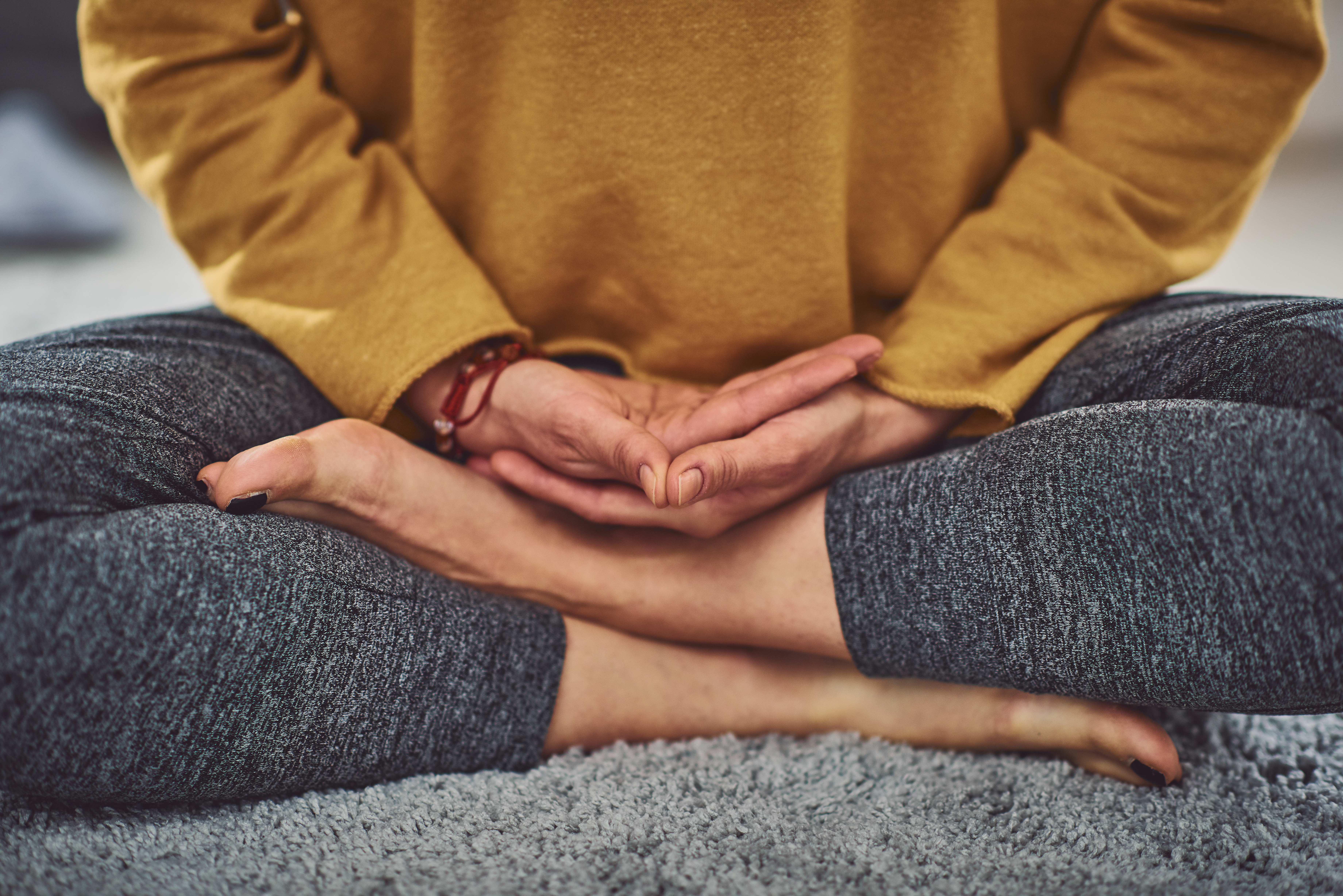 Close up of caucasian woman meditating indoors. Close up of caucasian woman meditating indoors.