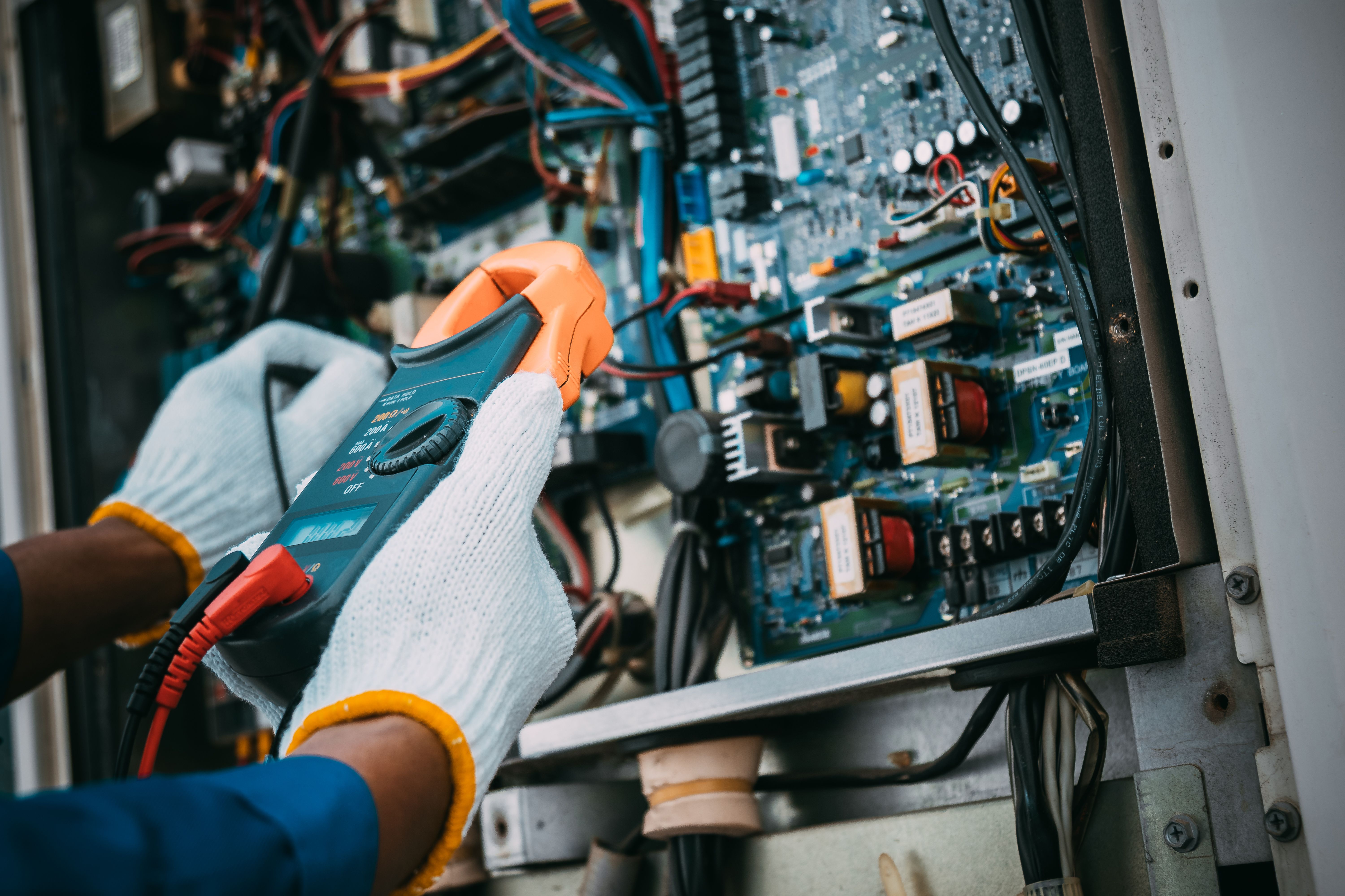 technician checking air conditioner