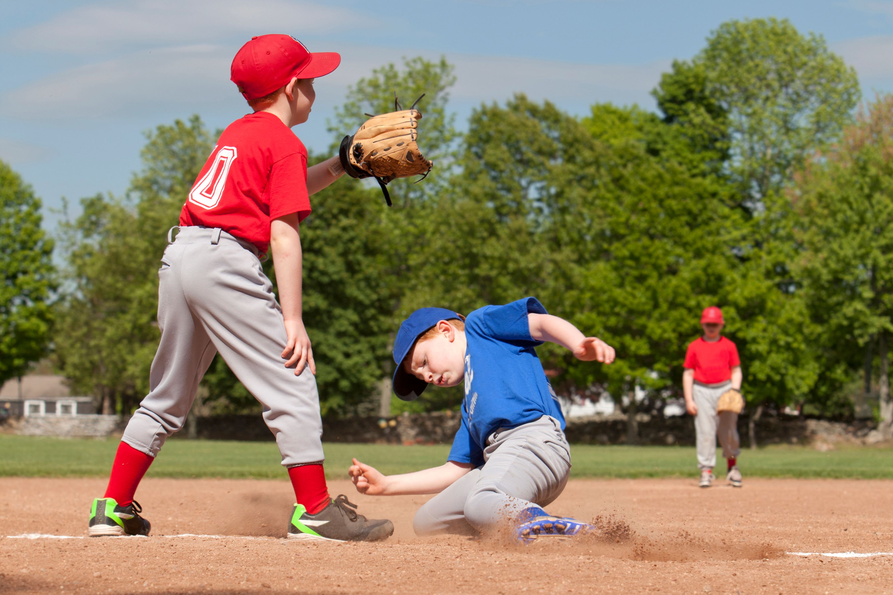 child playing baseball