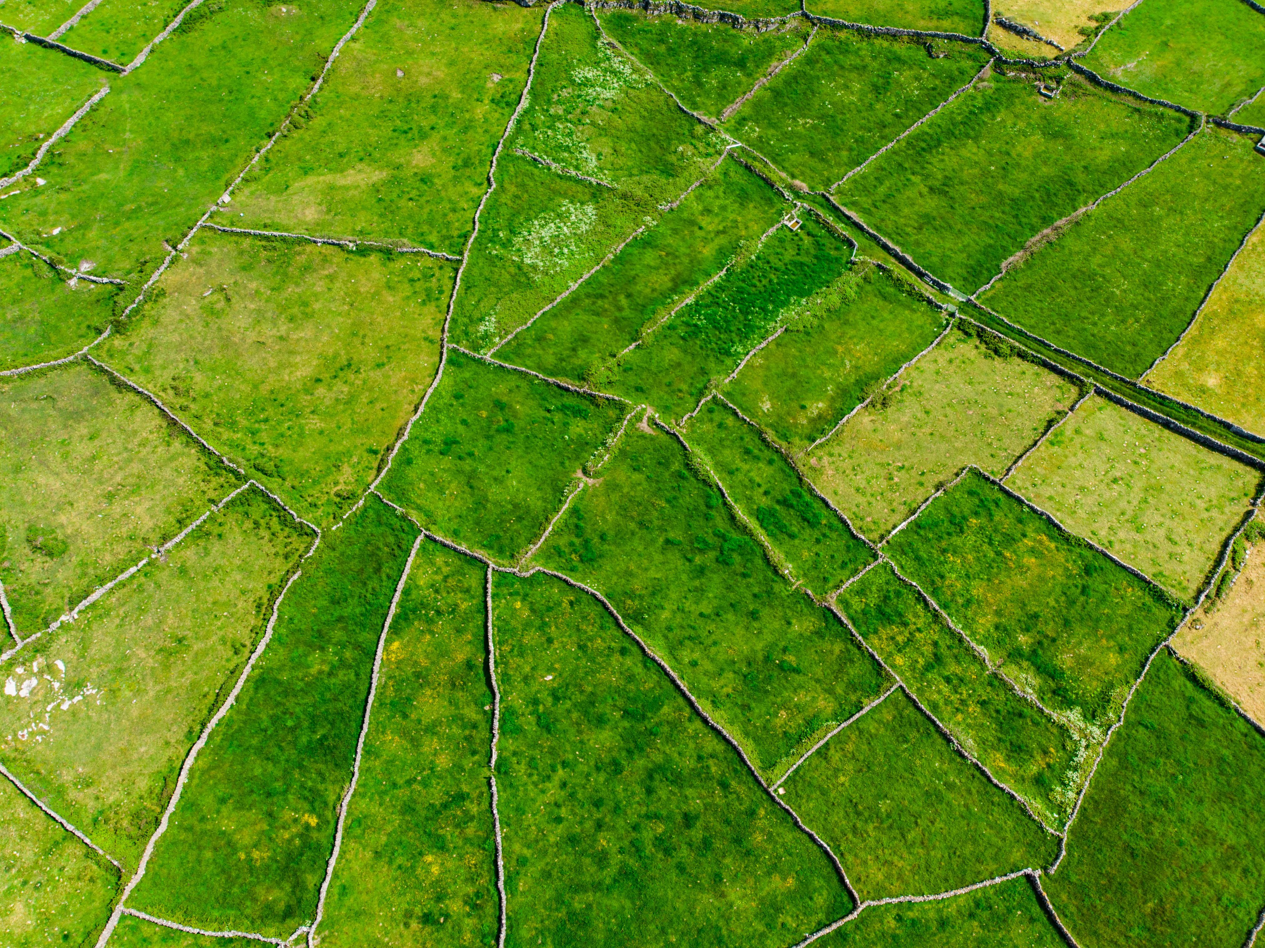Aerial view of Inishmore or Inis Mor, the largest of the Aran Islands in Galway Bay, Ireland. Aerial view of Inishmore or Inis Mor, the largest of the Aran Islands in Galway Bay, Ireland.