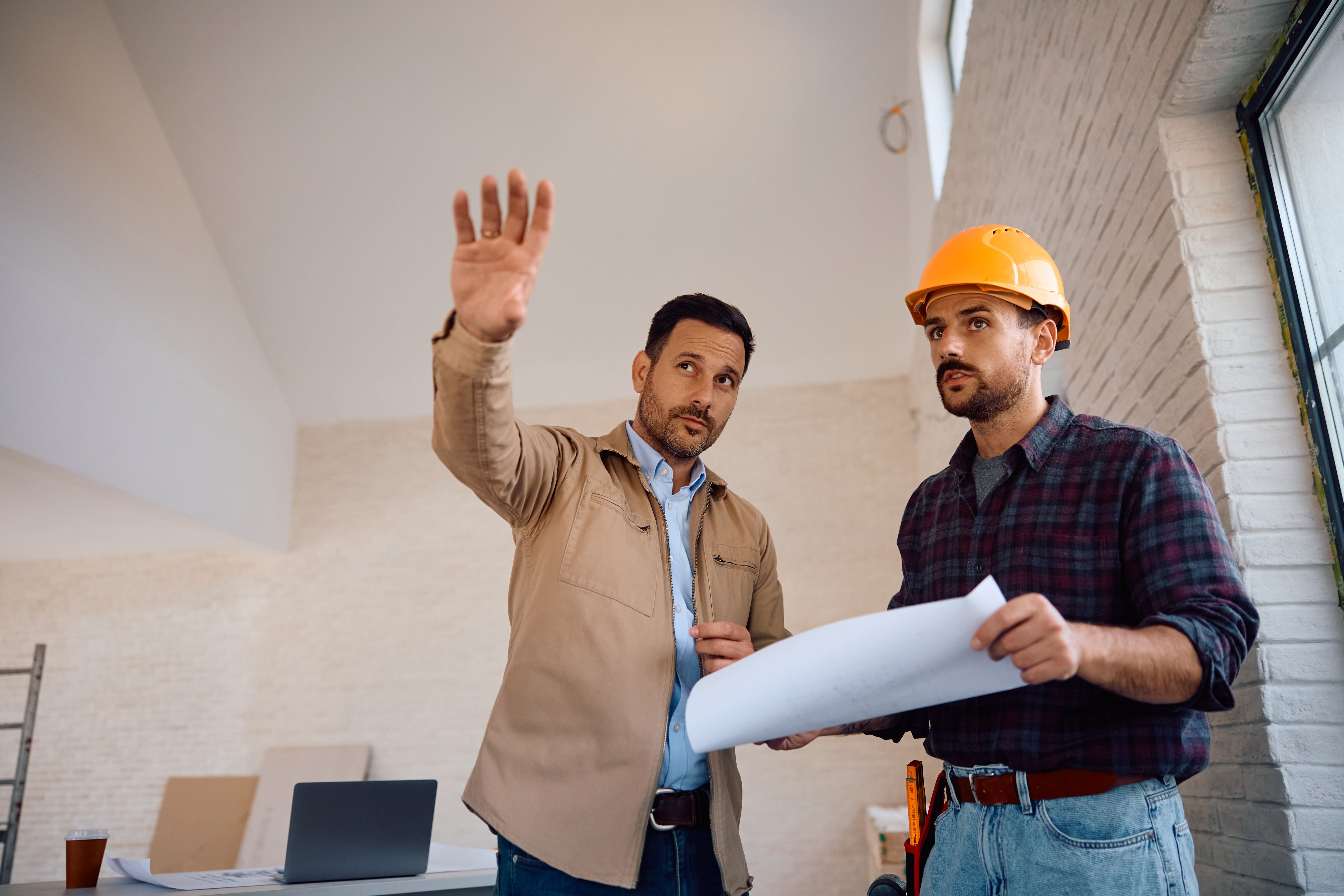 contractor reviewing plans