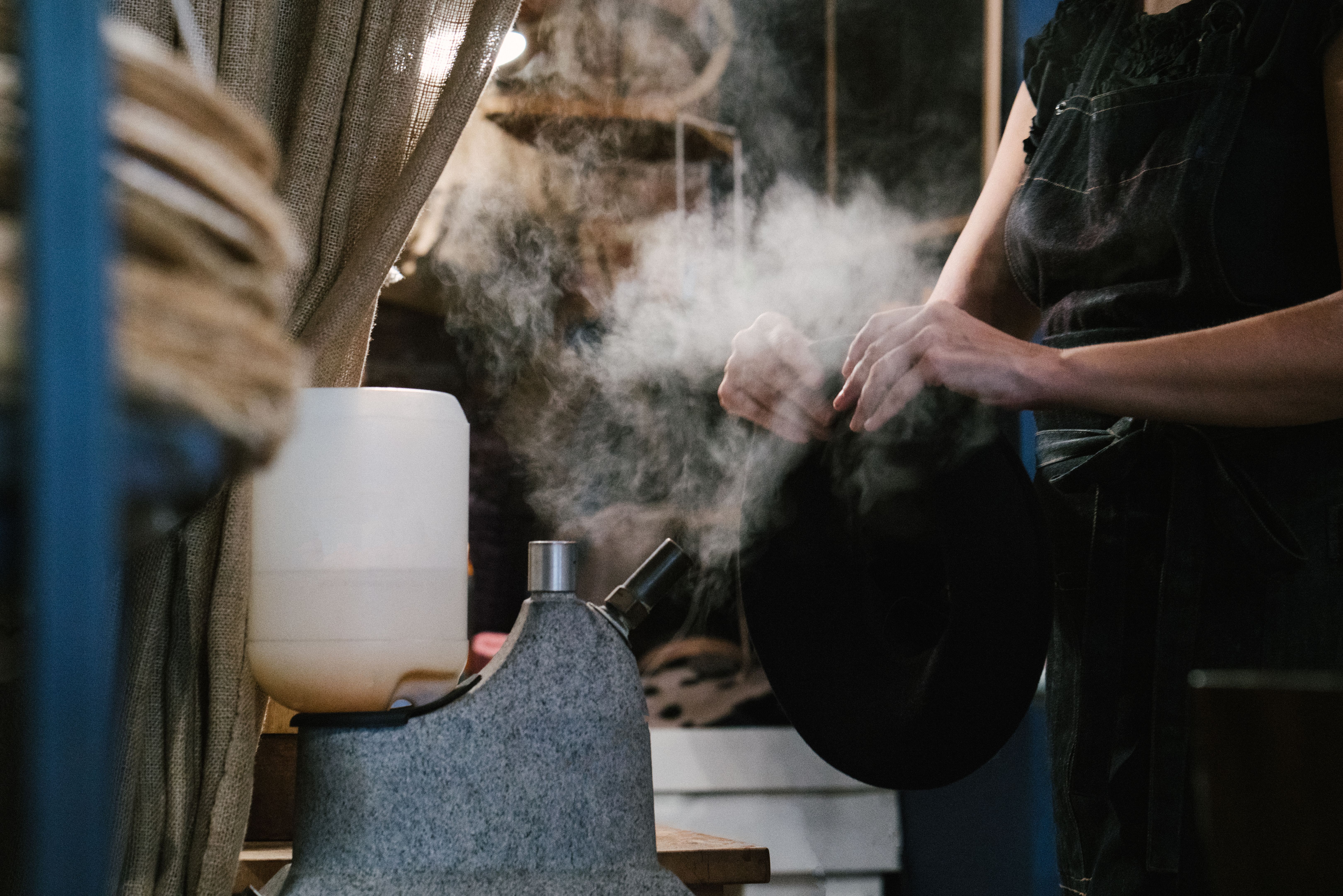 Milliner creating hats Milliner creating hats