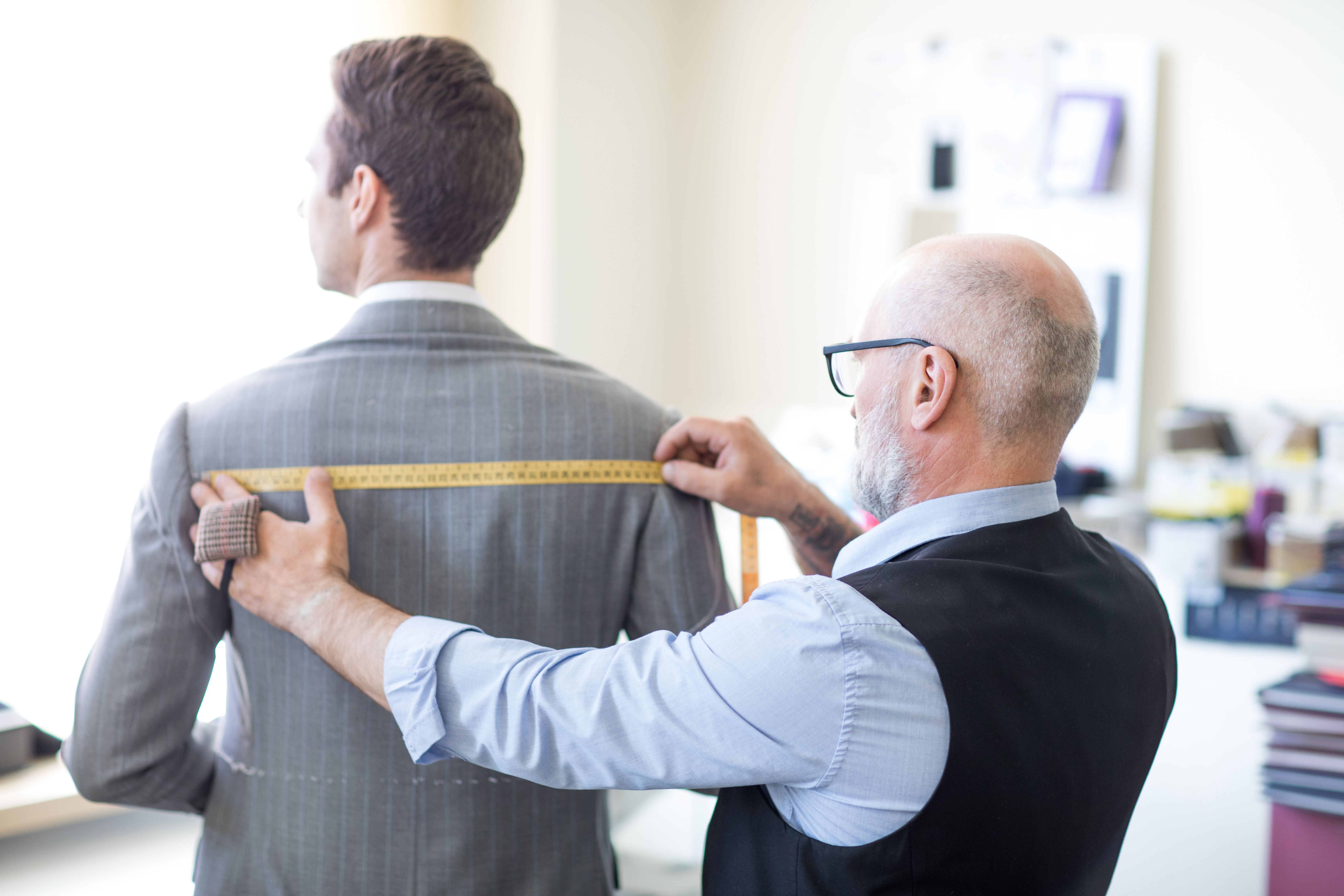 tailor fitting suit