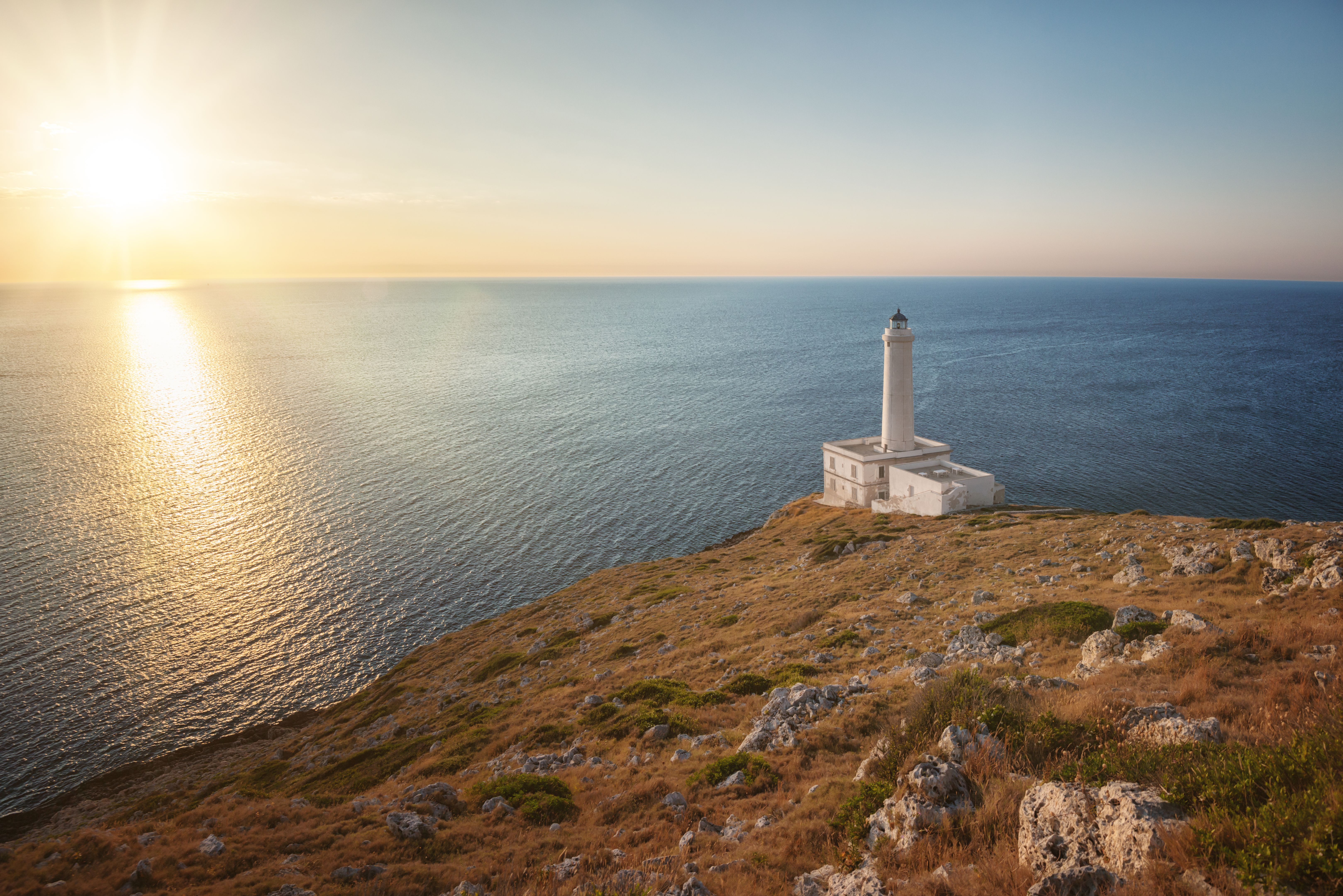 Rising sun at Lighthouse Punta Palascìa, Otranto, Italy, at dawn Rising sun at Lighthouse Punta Palascìa, Otranto, Italy, at dawn