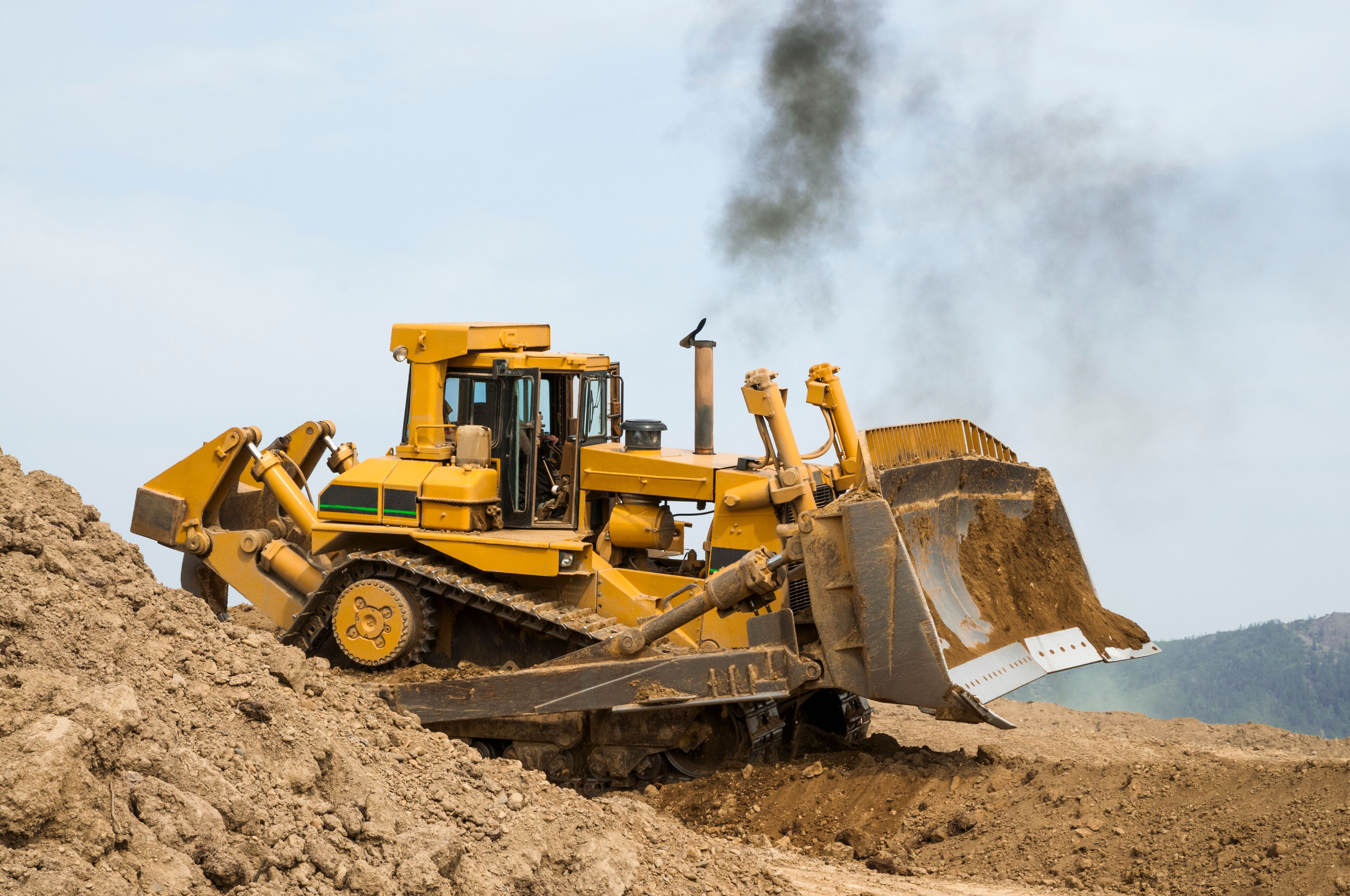 Bulldozer in open field operation