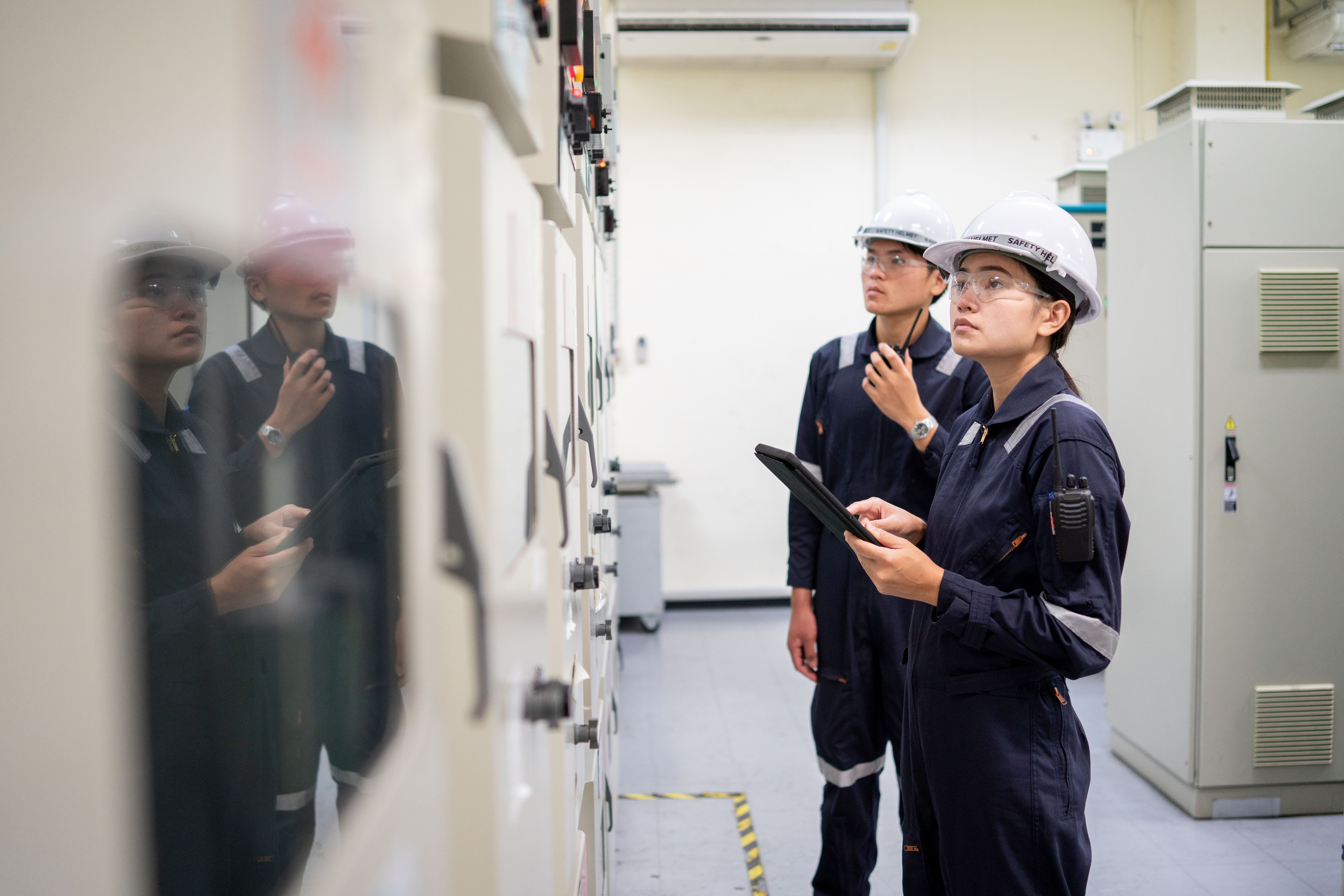 Electrical engineer technician in control room