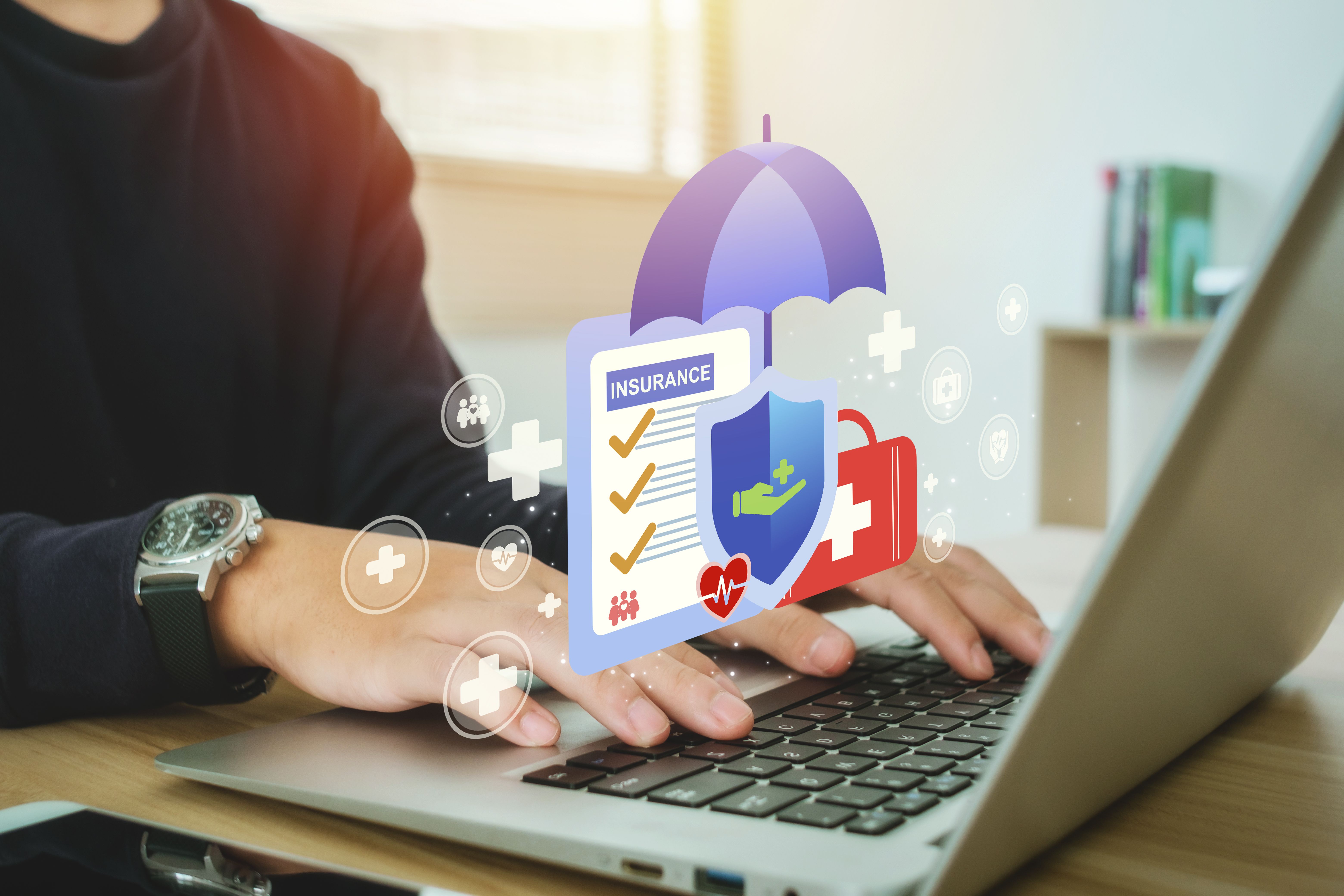 man using computer to get medical icons health insurance concept family health care Access to health benefits and copy space