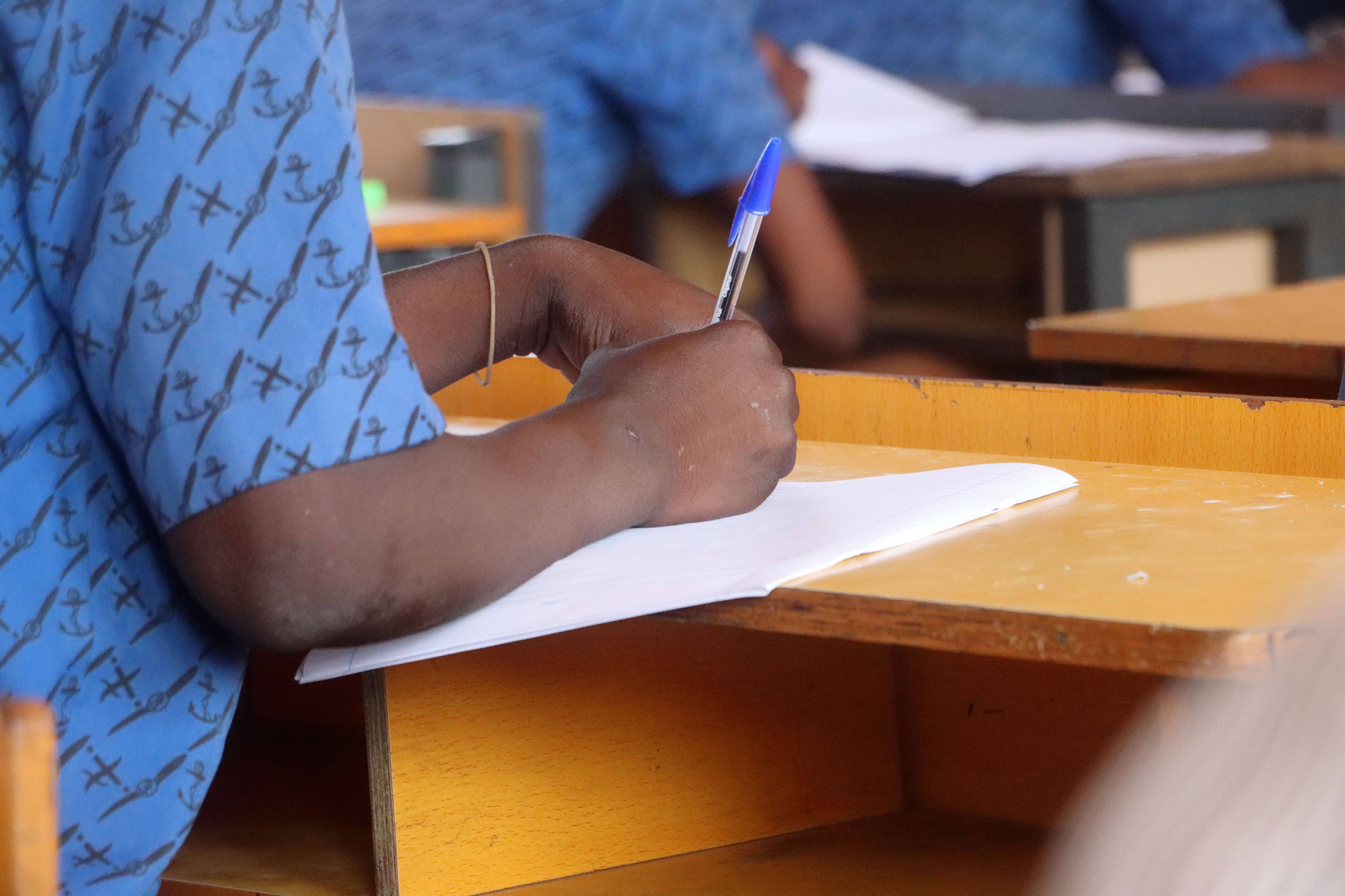 Future Minds: Diligent Ghanaian Student During National Exams