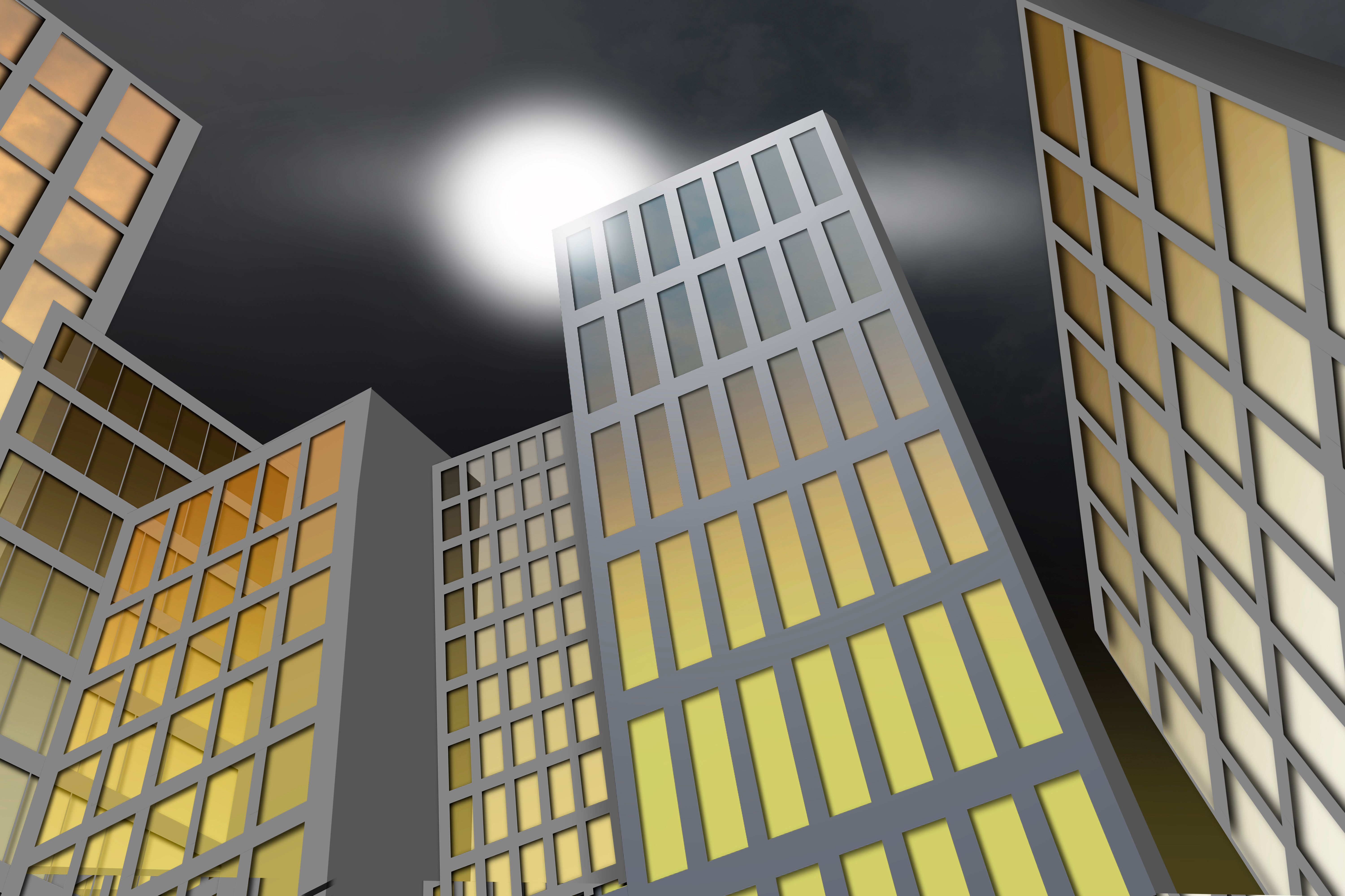 Glass facades of modern office buildings on dark sky Glass facades of modern office buildings on dark sky